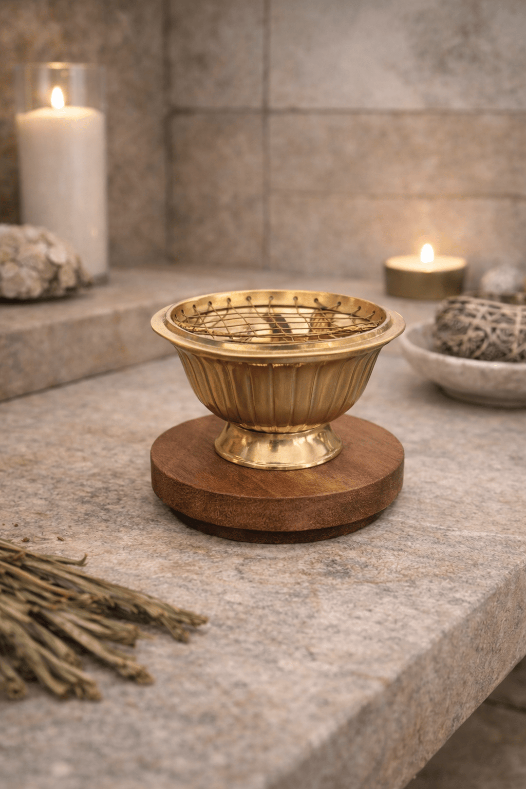 Brass resin incense burner with metal mesh screen and wooden base for charcoal burning.
