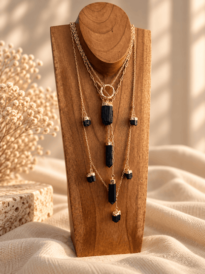 Black Tourmaline convertible T-bar necklace worn doubled in a layered crystal jewelry stack with obsidian lariat