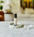 Clarity essential oil roll-on in amber bottle with metal roller top