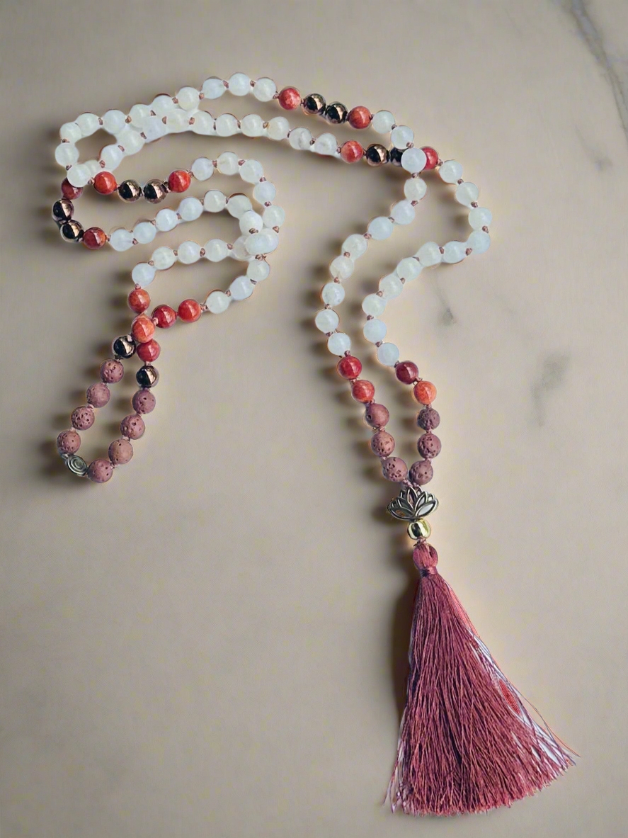 elemental balance crystal mala with lotus charm, designed for serenity, strength, and spiritual growth using nature's powerful elements