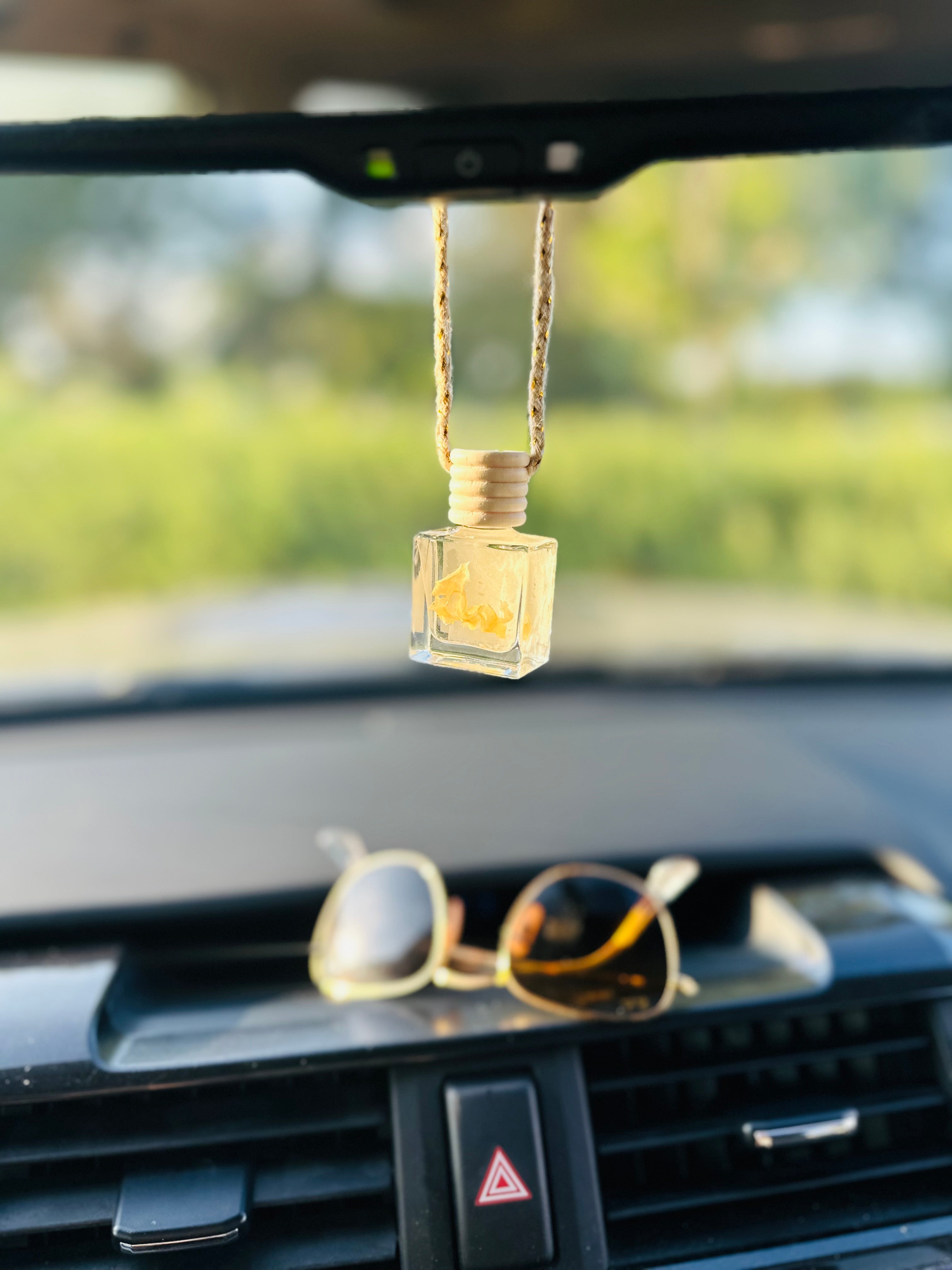 Non-toxic, natural car diffuser with cedarwood and citrus scents, perfect for eco-conscious drivers.