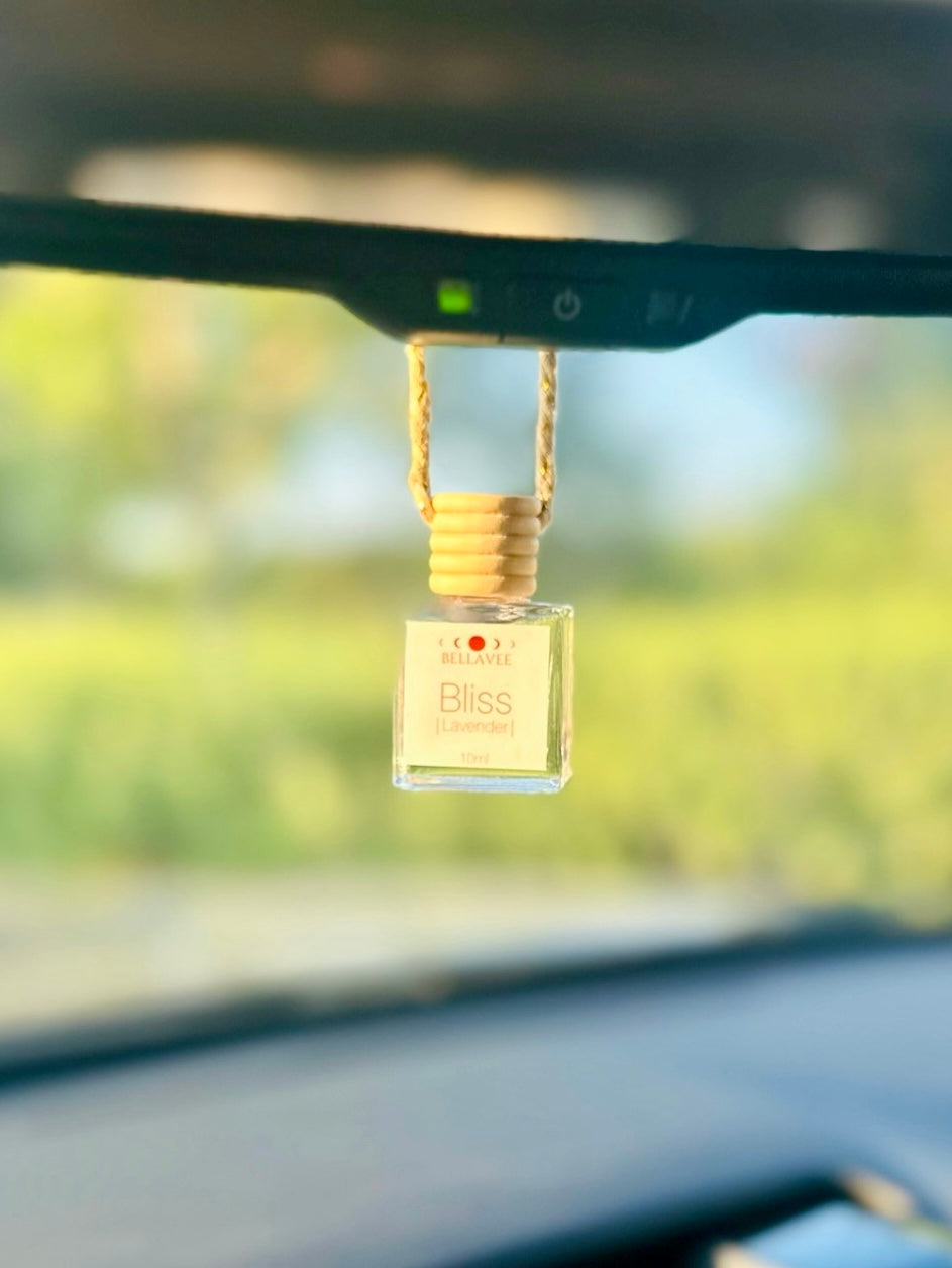 Eco-friendly car diffuser with rosemary and mint essential oils for a revitalizing aroma.