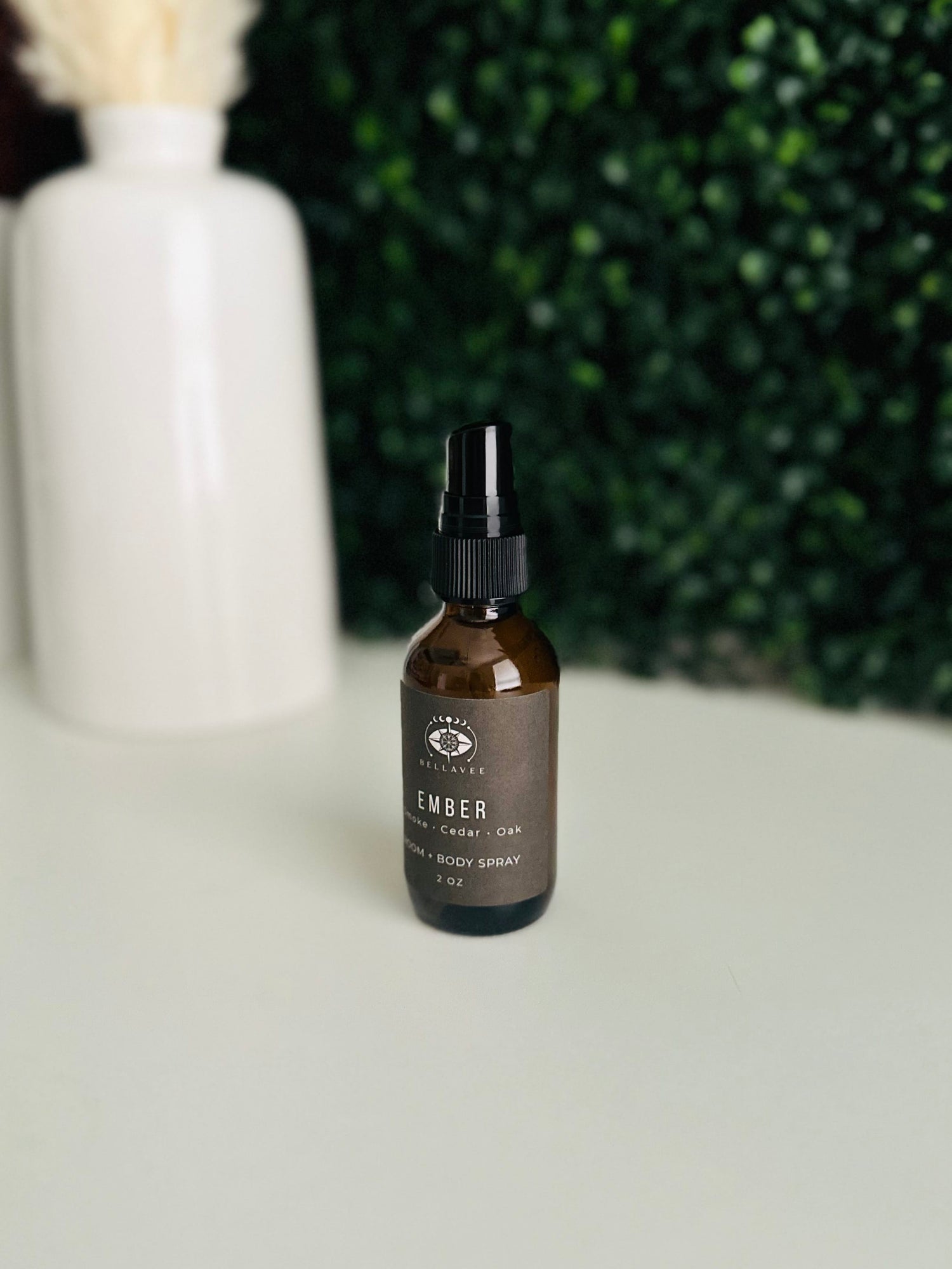 Woodsy room and body spray featuring smoke cedar and oak by BellaVee