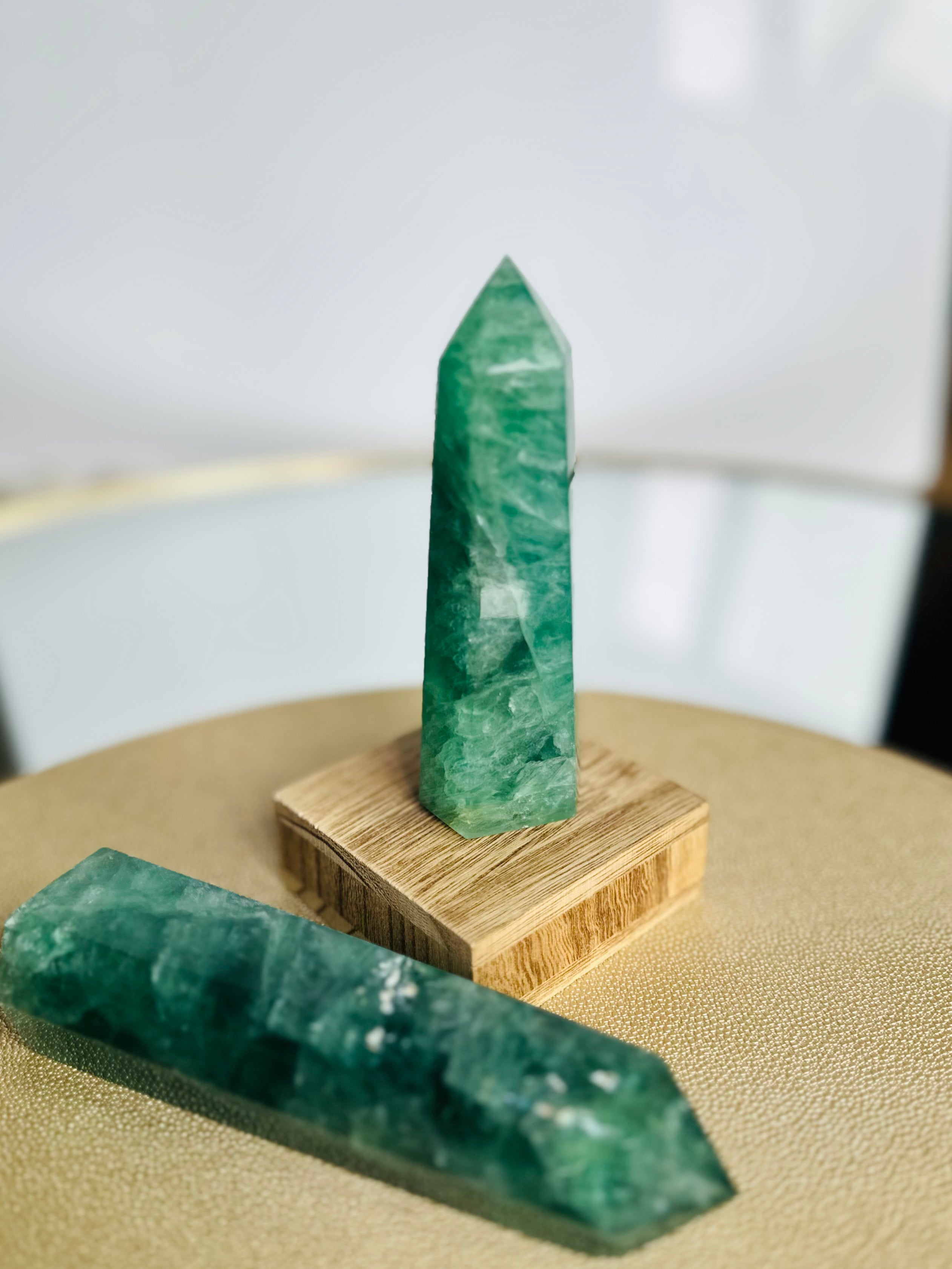 Polished Green Fluorite tower, known for its soothing vibrations and healing properties, ideal for harmonizing mind and soul