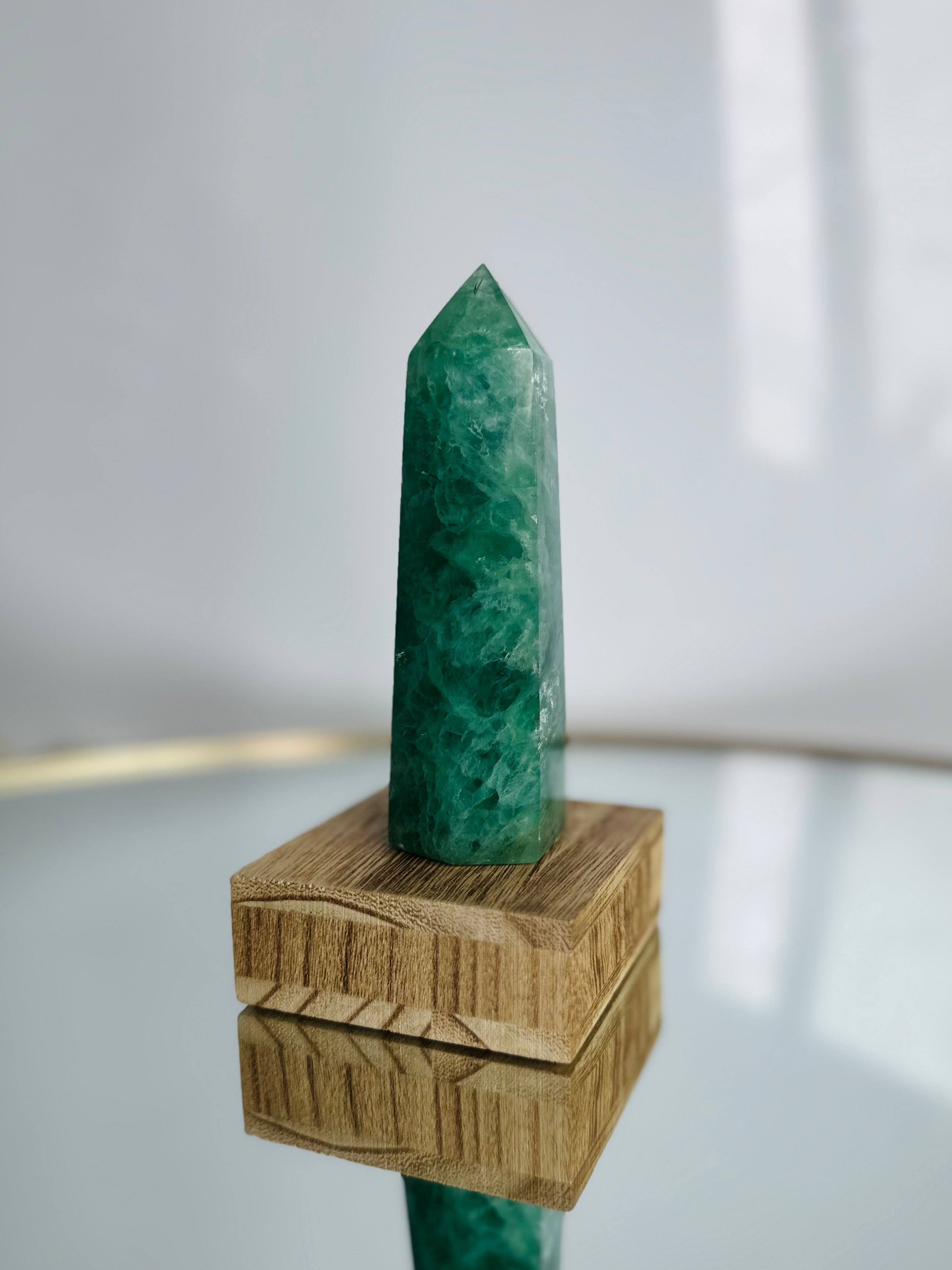 Beautifully standing Green Fluorite tower with calming green hues, radiates peaceful energy, perfect for healing and display