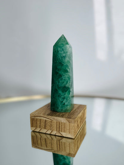 Beautifully standing Green Fluorite tower with calming green hues, radiates peaceful energy, perfect for healing and display