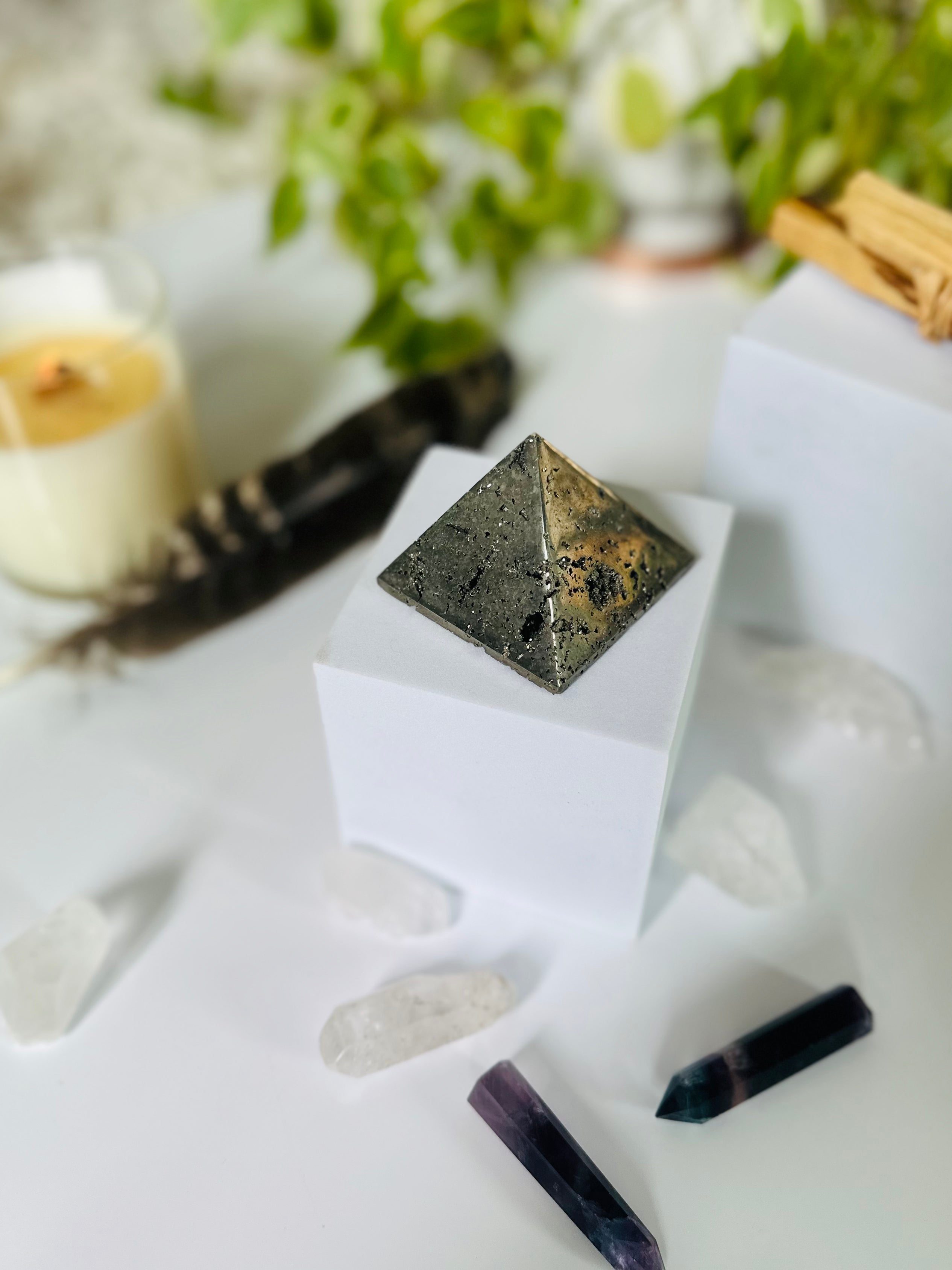 Pyrite Pyramid, known for its golden luster, attracts prosperity, offers protection, and boosts confidence in your home or workspace