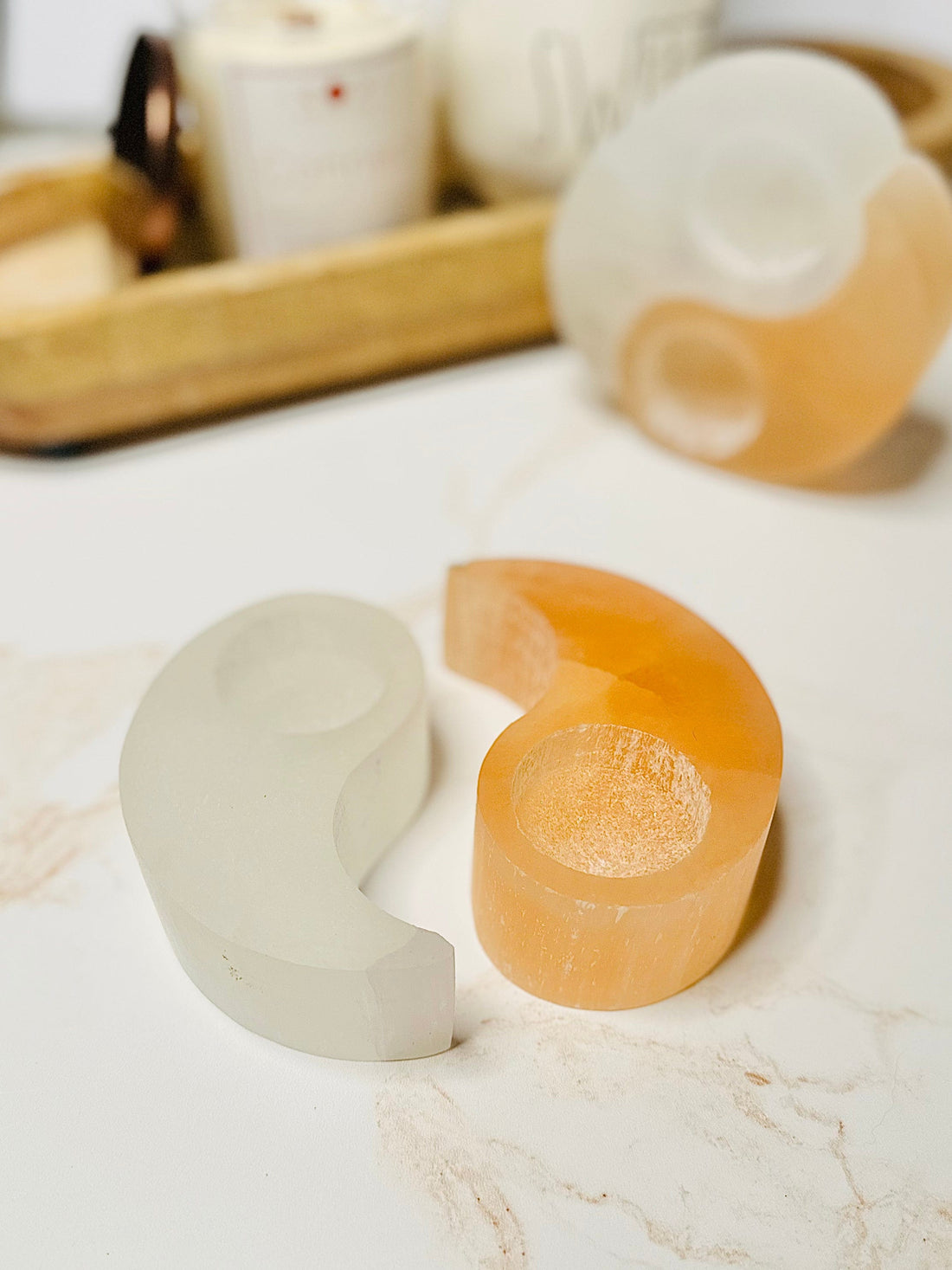 Bring peace and balance to any room with the Selenite Yin &amp; Yang Candle Holder, casting a soft glow and enhancing spiritual clarity