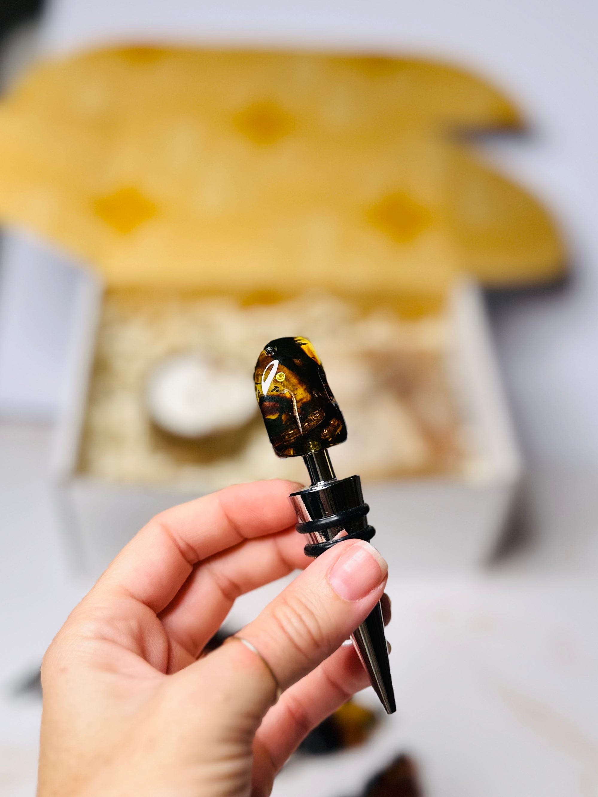 Amber-topped wine stopper, adding elegance and functionality to your wine collection.