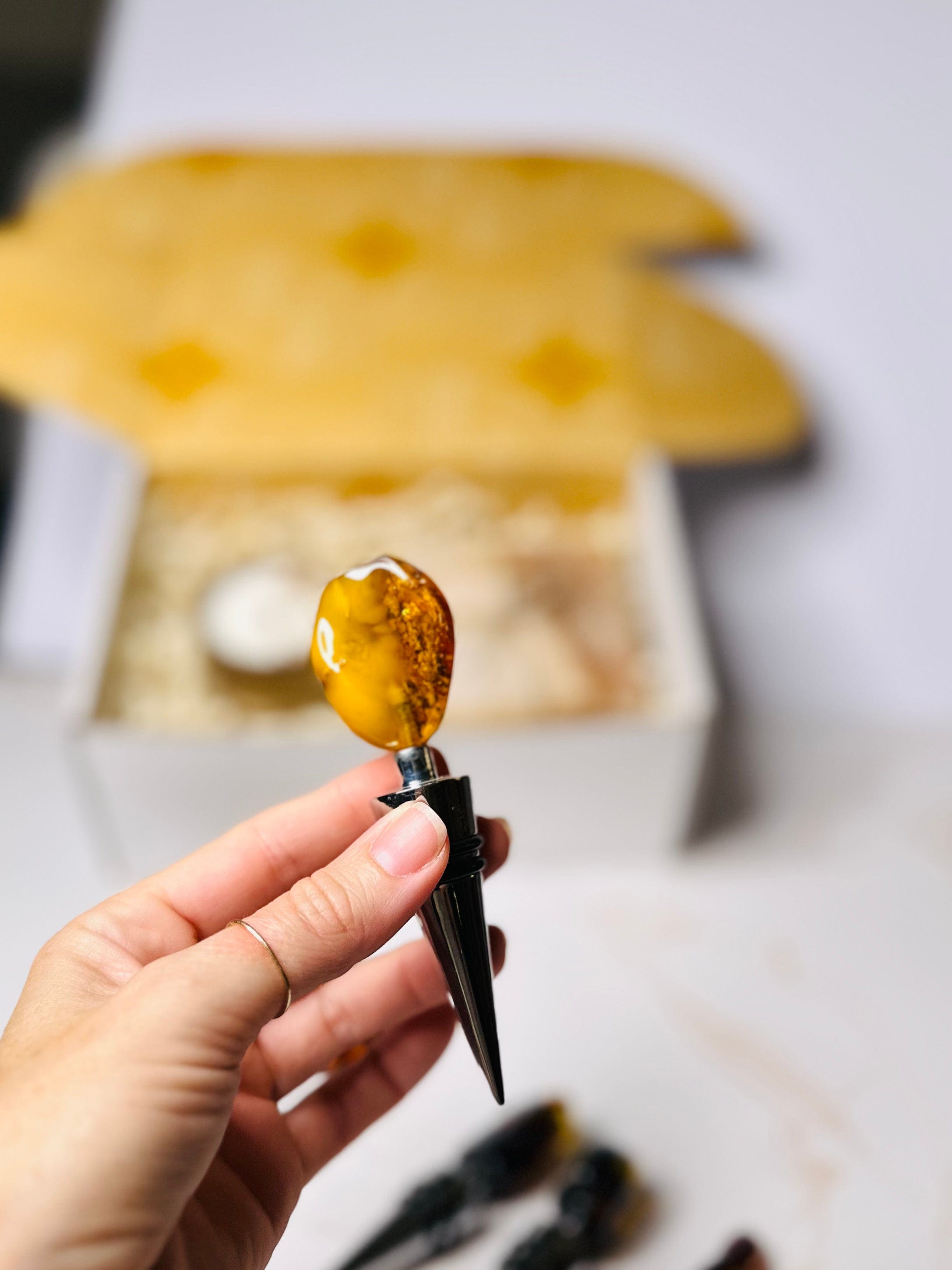 Amber wine stopper, offering a unique and beautiful way to preserve your favorite wine.