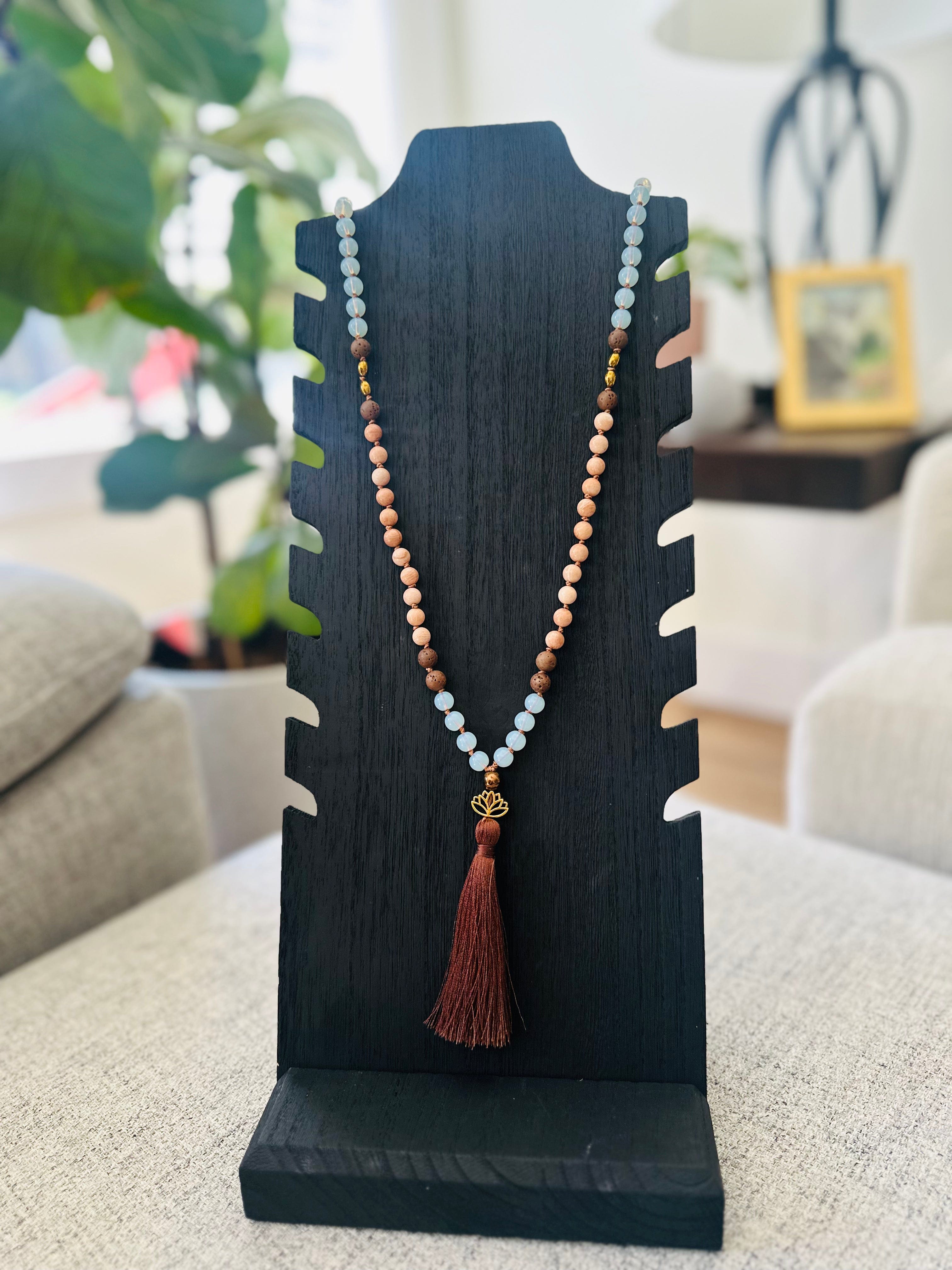 Grounding Mala featuring Lava, Hematite, and soothing Peach Moonstone for balance, protection, and spiritual alignment