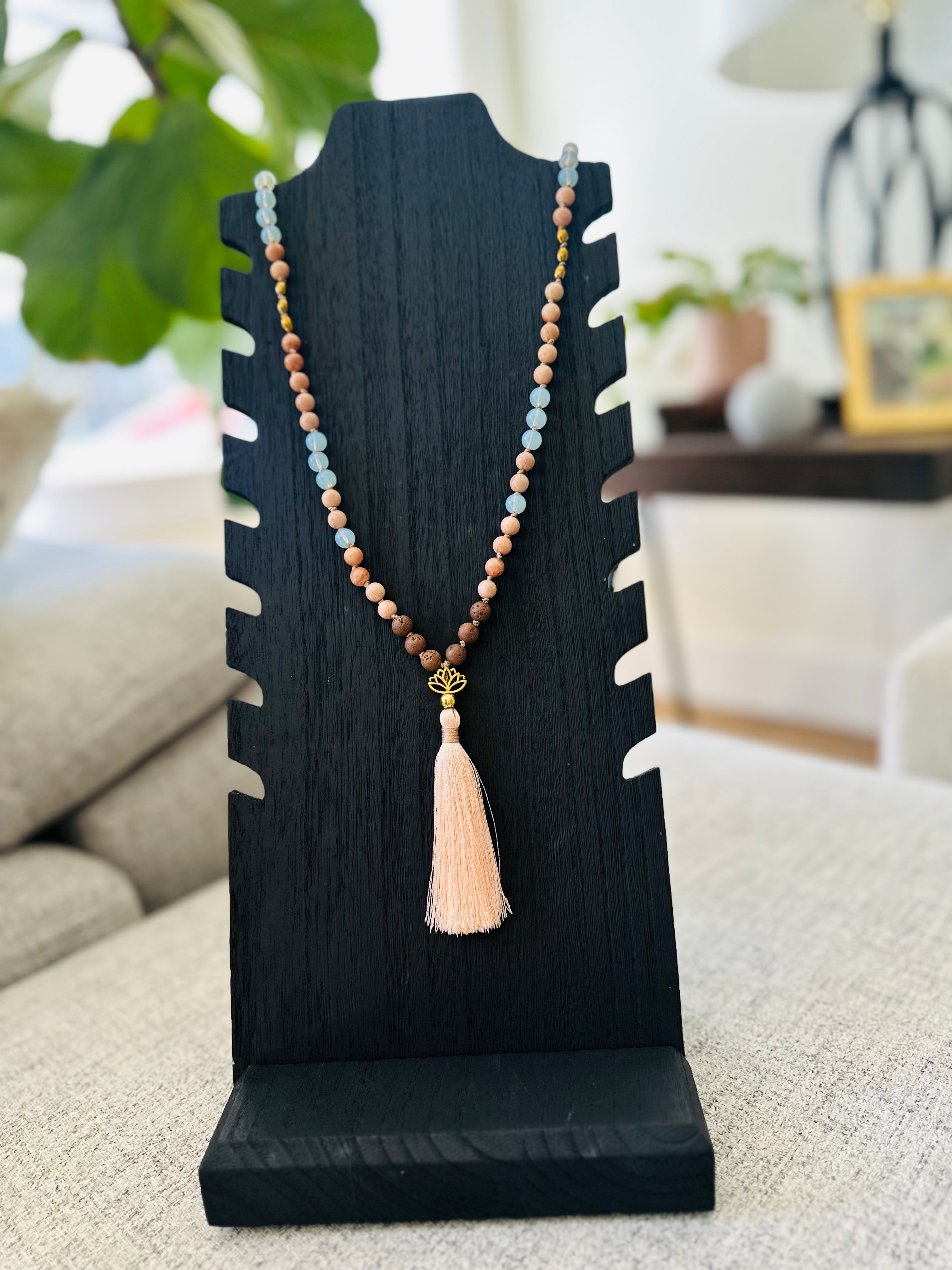 Spirit of Balance Mala supports balance, clarity, and strength with Lava, Opalite, Peach Moonstone, and Hematite for meditation or daily wear