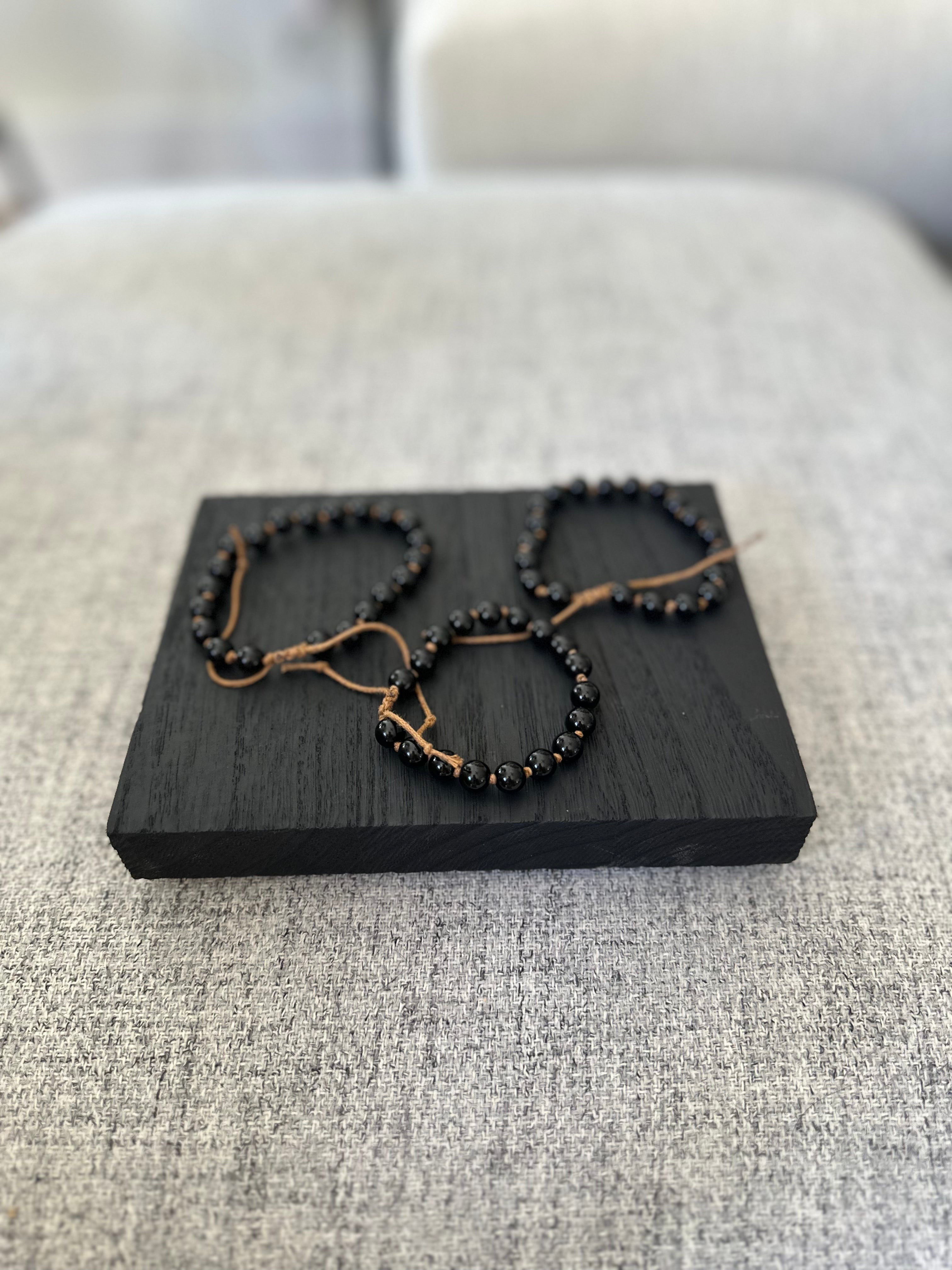 Knotted Obsidian Bracelet with adjustable design, perfect for daily wear, providing grounding and shielding from negativity