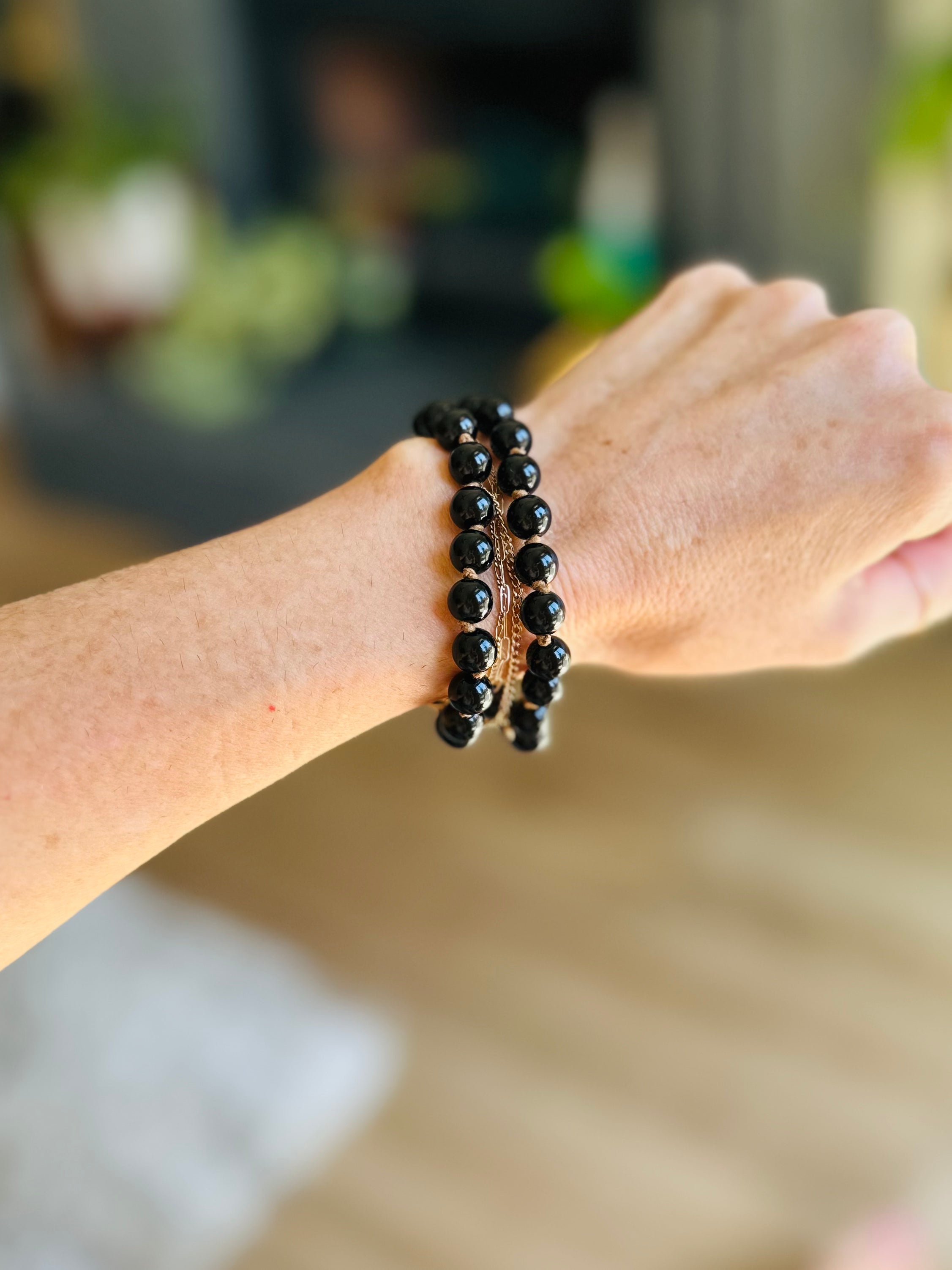 Worn daily, the adjustable Obsidian Beaded Bracelet provides emotional protection and absorbs negativity, keeping you balanced and grounded