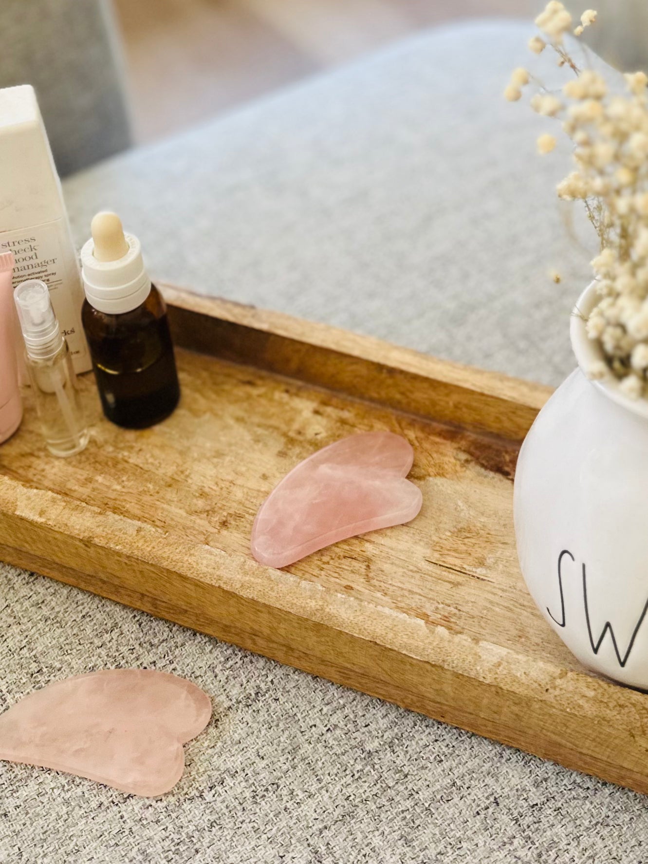 Rose Quartz Gua Sha Tool, designed to soothe and lift skin, promotes love, harmony, and natural radiance during facial massage