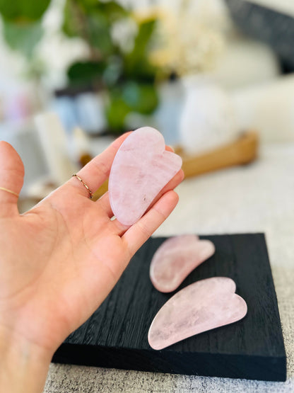 Facial Rose Quartz Gua Sha, perfect for enhancing your beauty ritual with calming energy, reducing puffiness, and boosting circulation