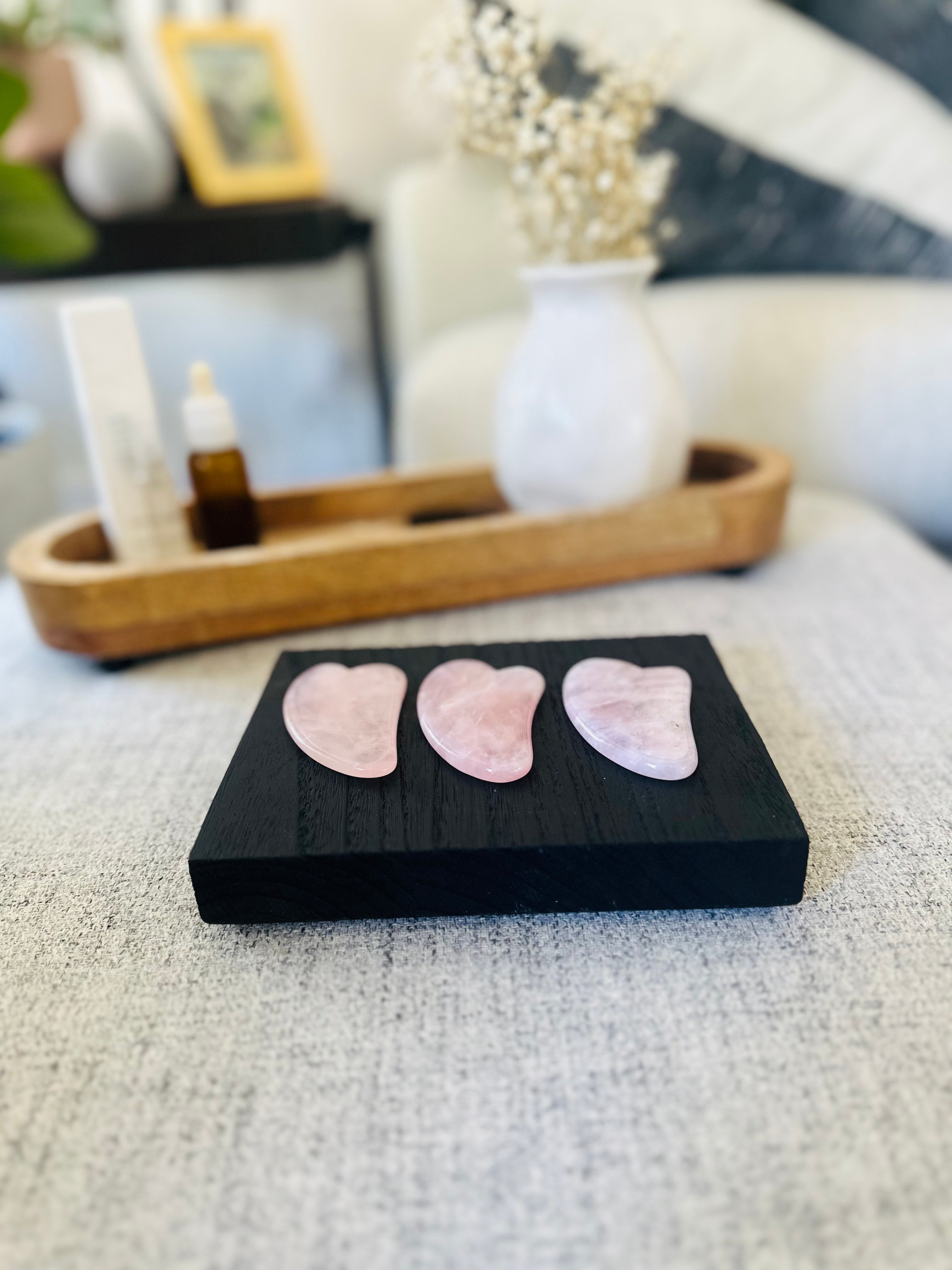 Rose Quartz Gua Sha Tool for facial massage, promotes love, healing, reduces puffiness, and enhances skin circulation and natural glow