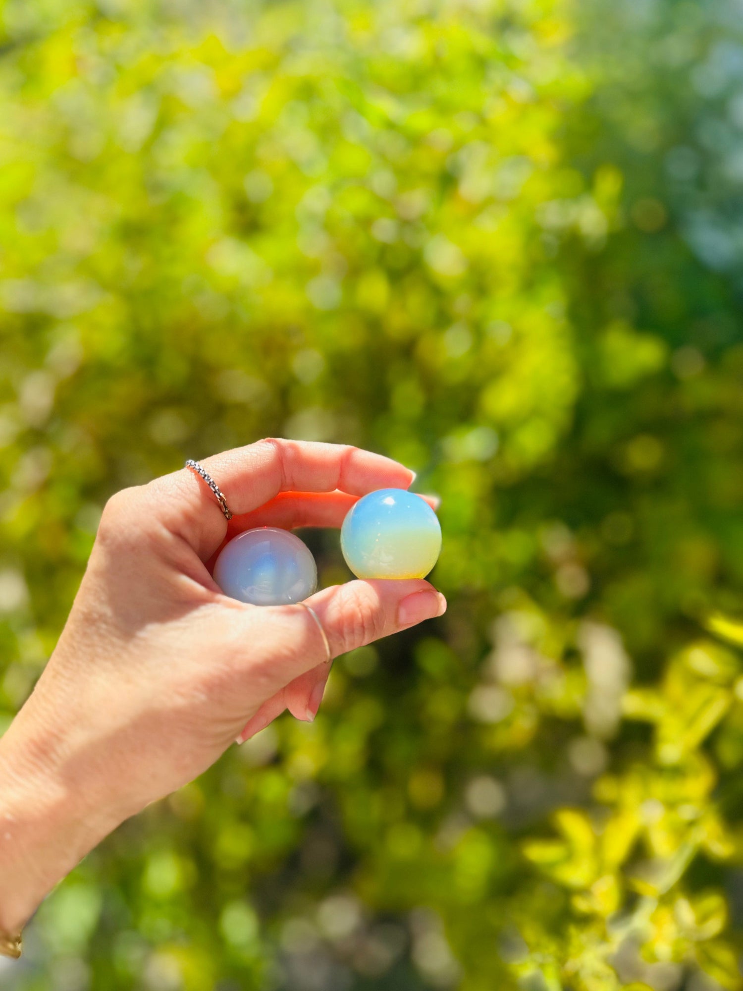 This Opalite Sphere invites tranquility and harmony into your space, making it ideal for energy work, meditation, or spiritual growth