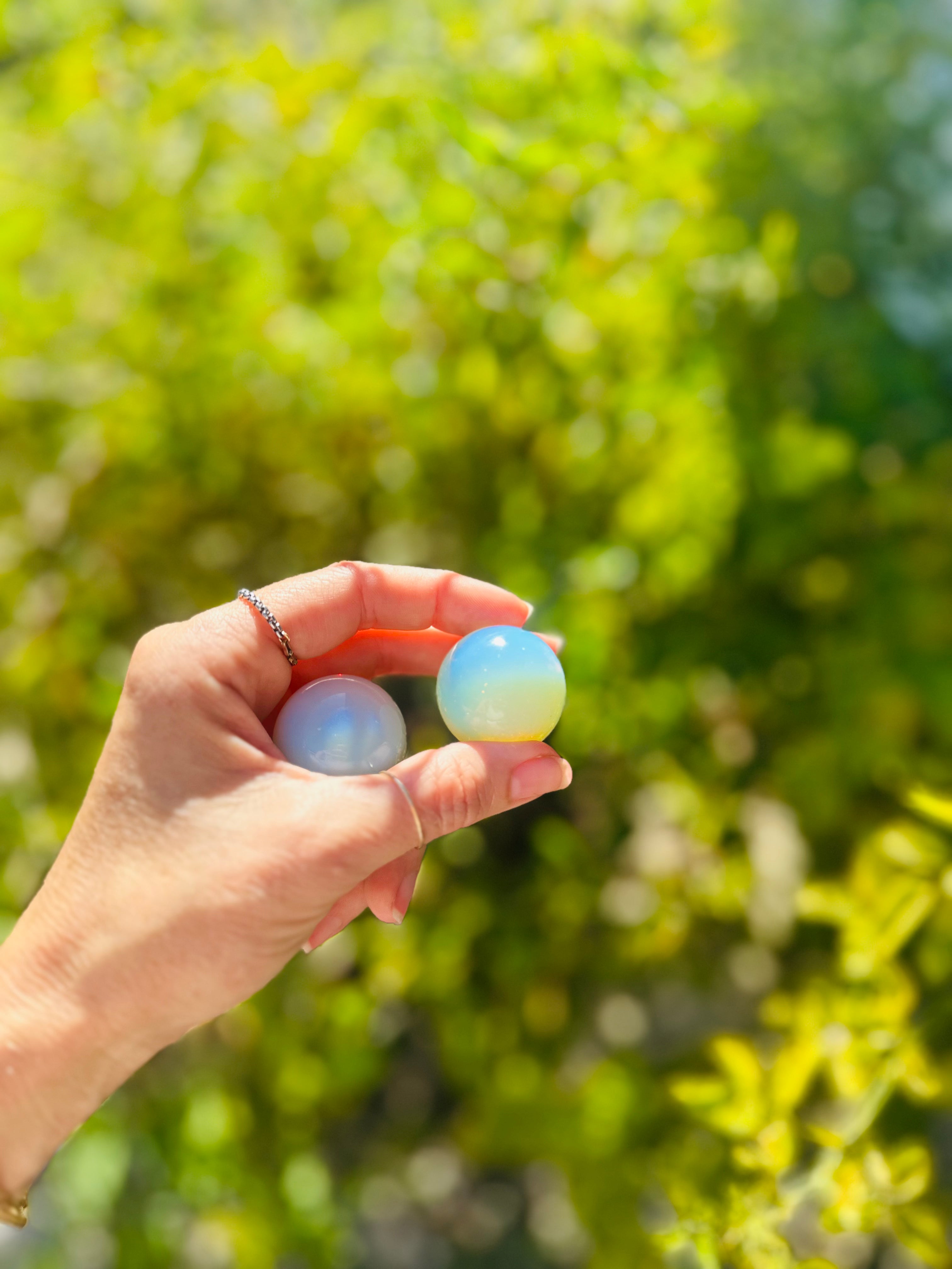 This Opalite Sphere invites tranquility and harmony into your space, making it ideal for energy work, meditation, or spiritual growth