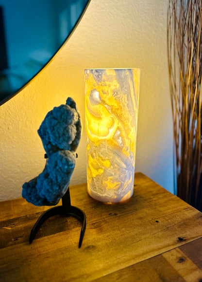 Cloudy Onyx Crystal Lamp illuminated, casting a warm, serene glow to create a tranquil atmosphere