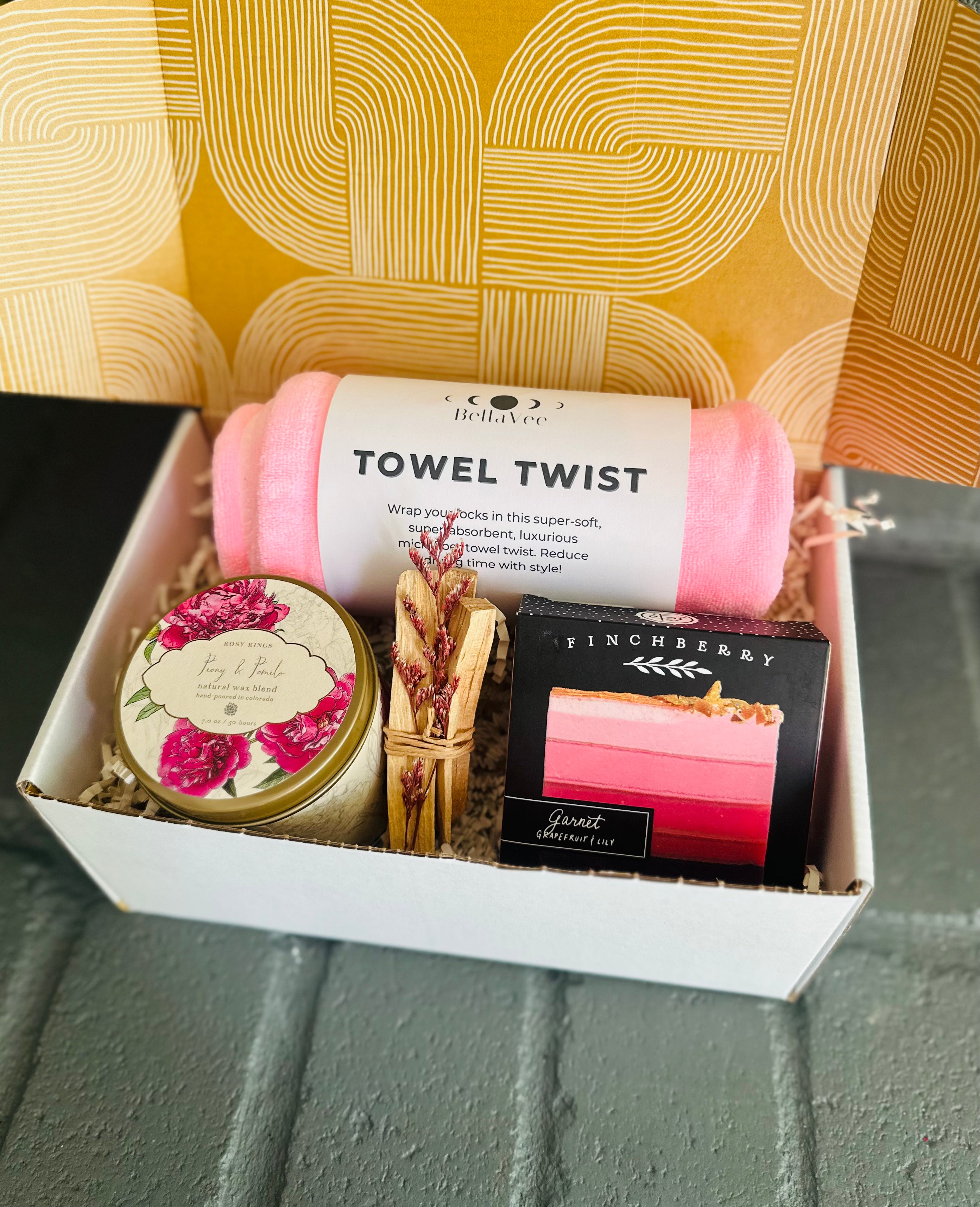 Enjoy self-care with Pink Vibes Gift Box: Trina Towel Twist, Garnet soap, Palo Santo, and Peony & Pomelo candle for joyful vibes