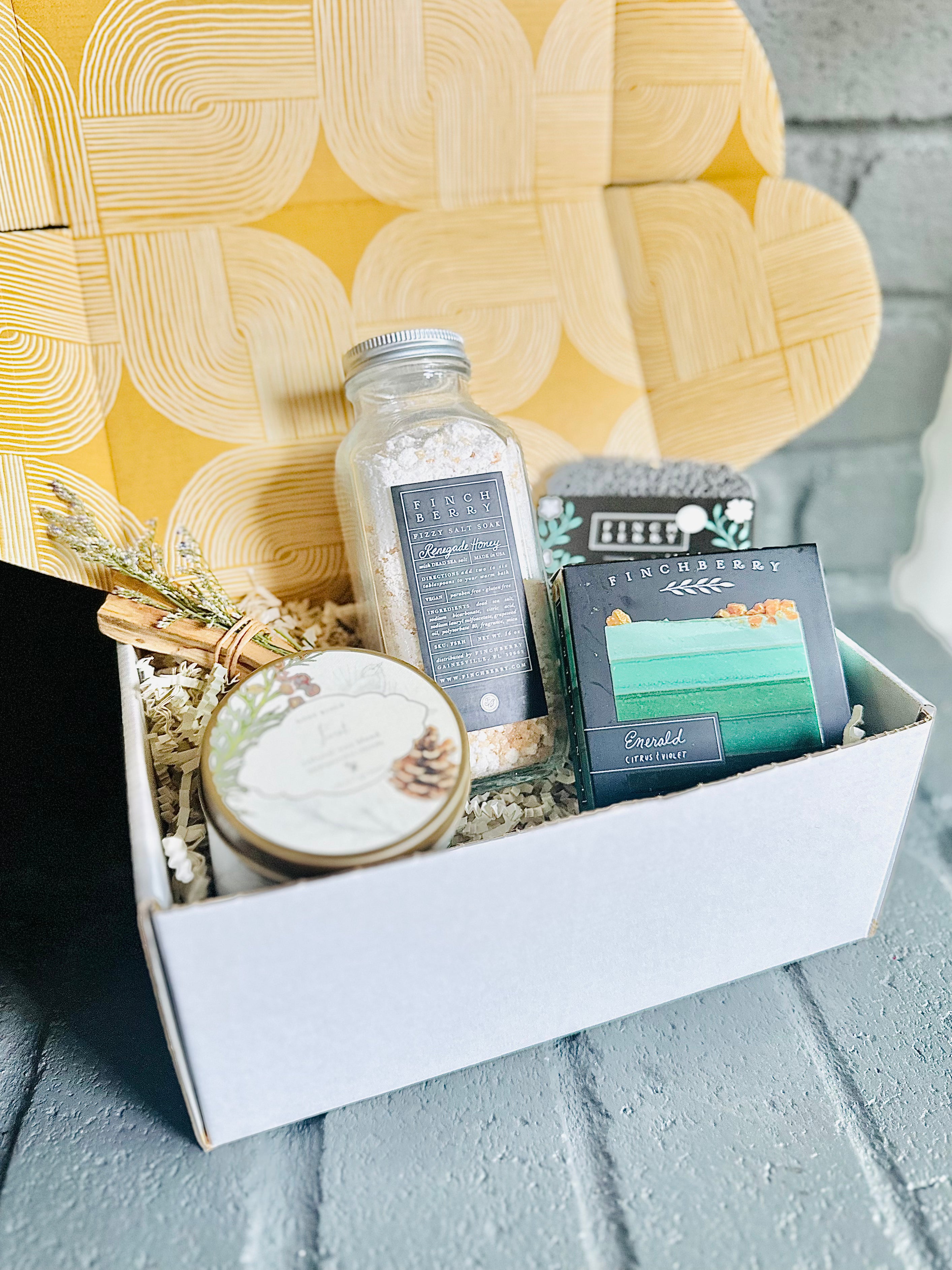 forest retreat gift set includes forest tin candle, botanical bath fizzies, luxury vegan soap, and palo santo, ideal for unwinding and peace