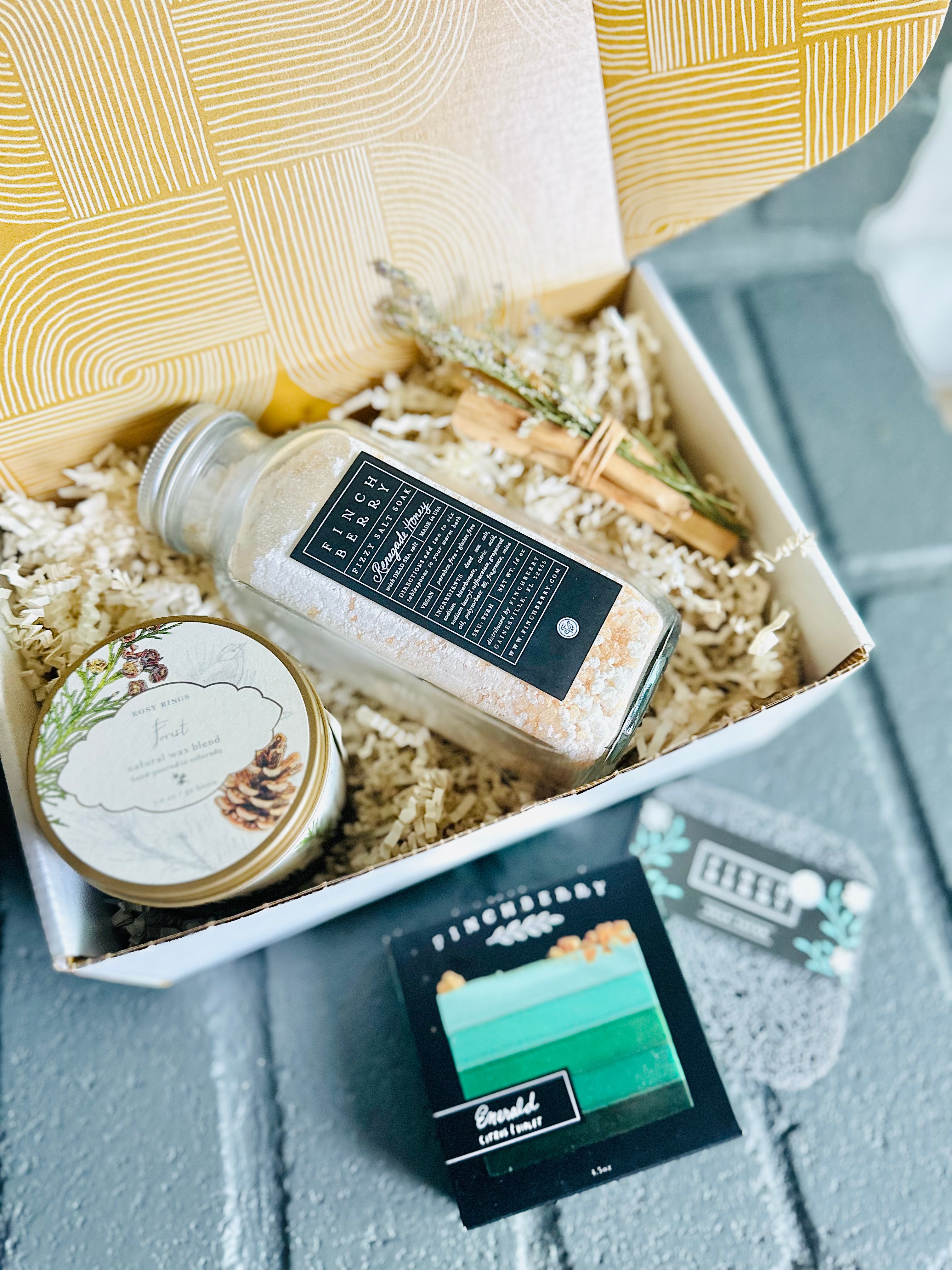 forest retreat gift box with soothing bath fizzies, luxury soap, palo santo, and forest tin candle, perfect for relaxation and tranquility