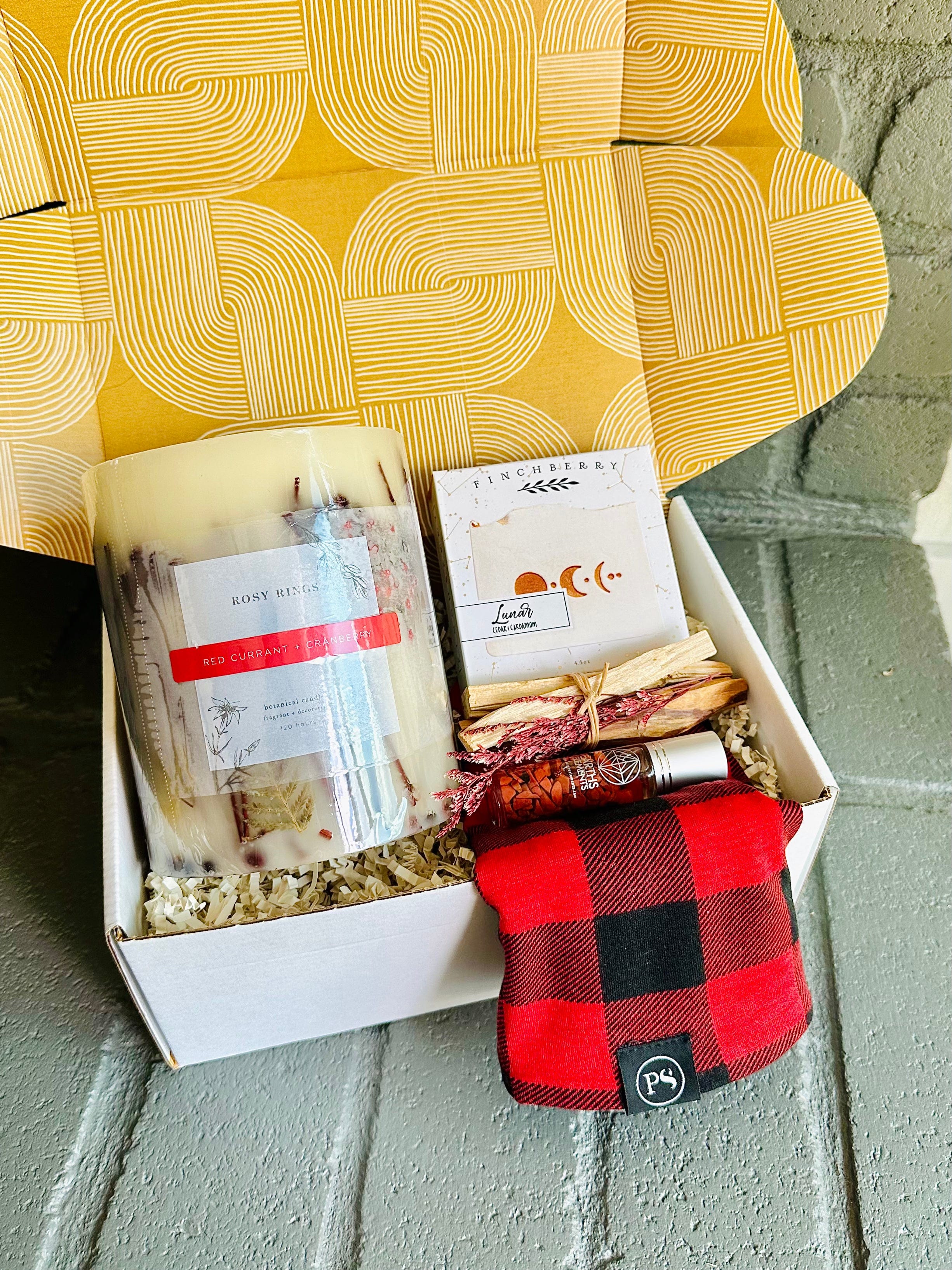 Winter Warmth Gift Box offers a little of everything: candle, Palo Santo, soap, roll-on, and beanie for ultimate holiday relaxation