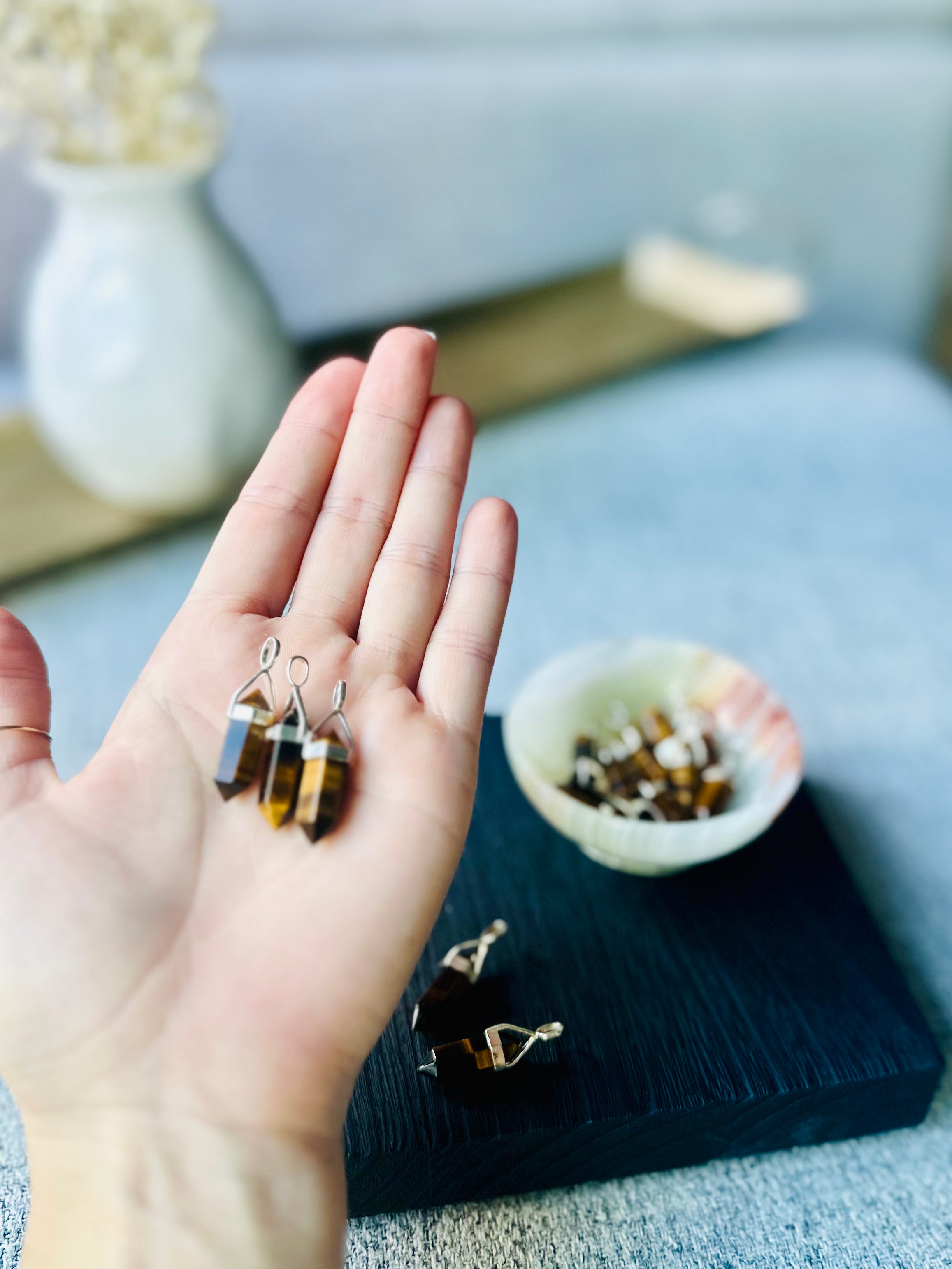 tigers eye double-terminated pendant in sterling silver, promotes confidence and grounding energy, featuring golden-brown hues