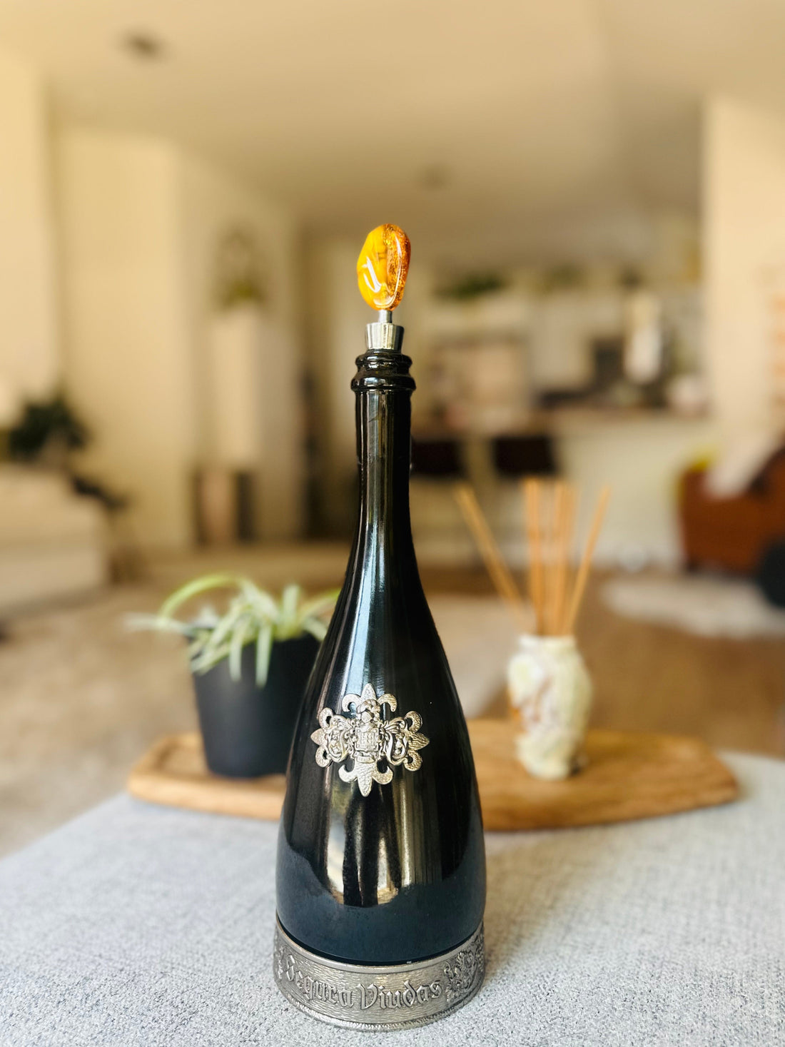 Handcrafted amber-topped wine stopper made with genuine Baltic amber, adding elegance to your collection.