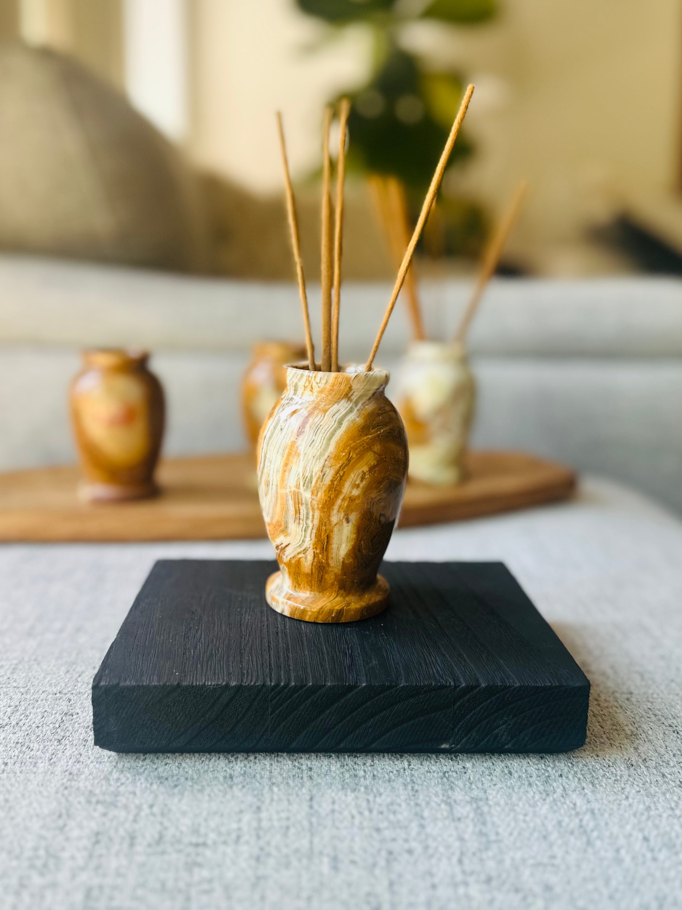 Onyx Vase, featuring natural earth tones and protective energy, adds elegance and stability to any home or spiritual space