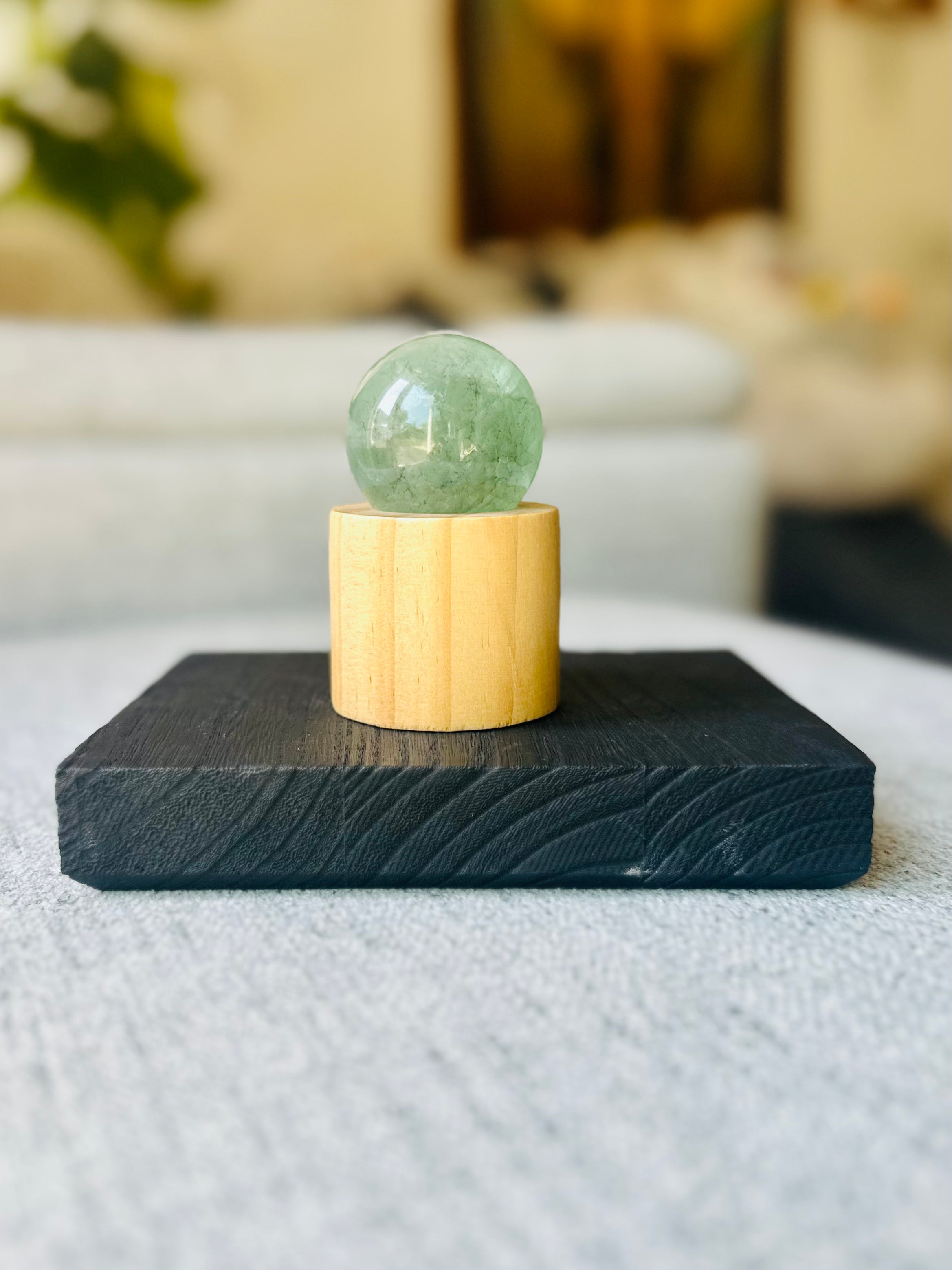 Green Fluorite sphere with soothing green tones, promotes mental clarity, focus, and balance, perfect for meditation and healing