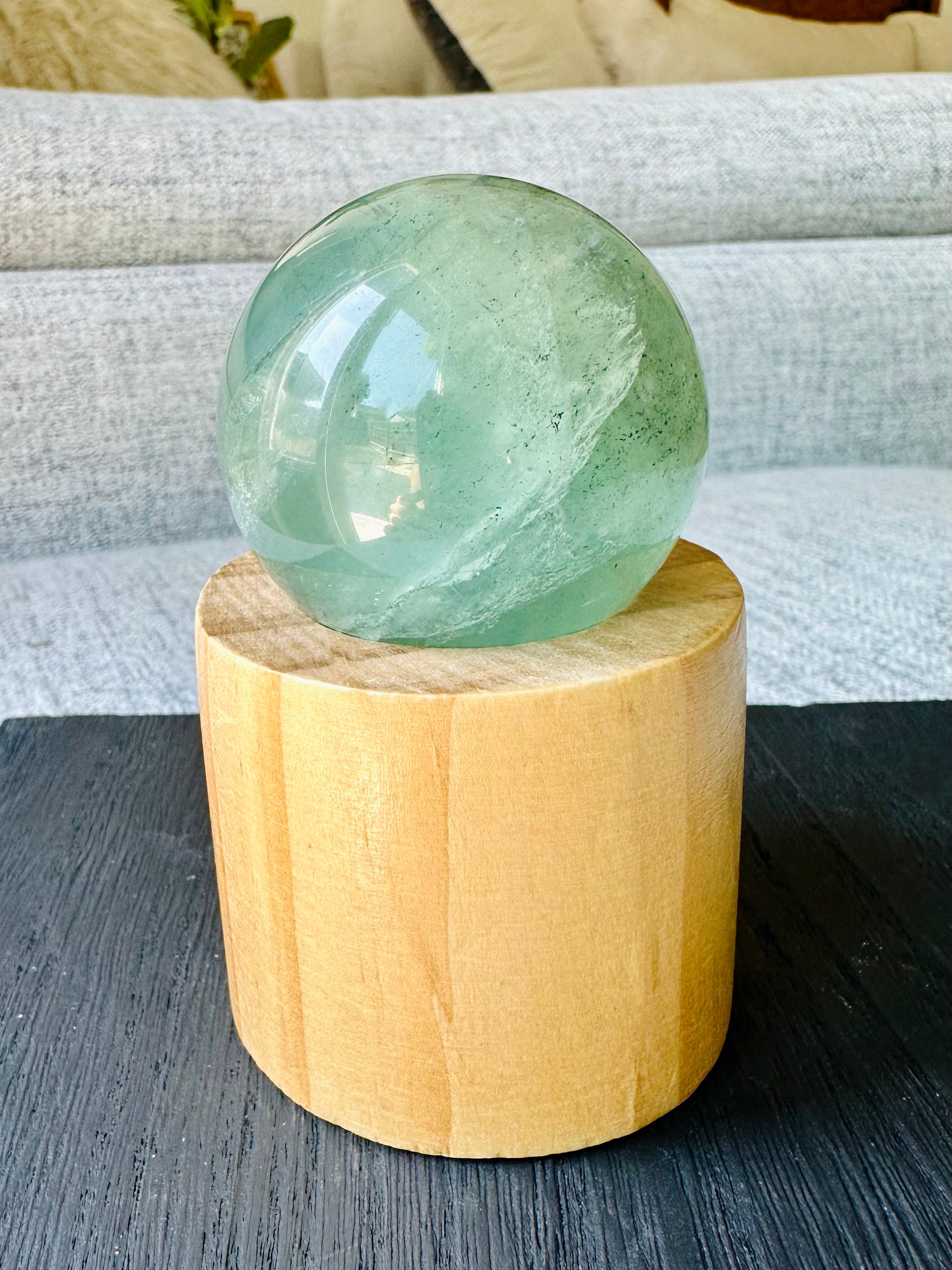 Green Fluorite sphere, radiates tranquility and harmony, perfect for meditation, healing practices, or as a stunning crystal display piece