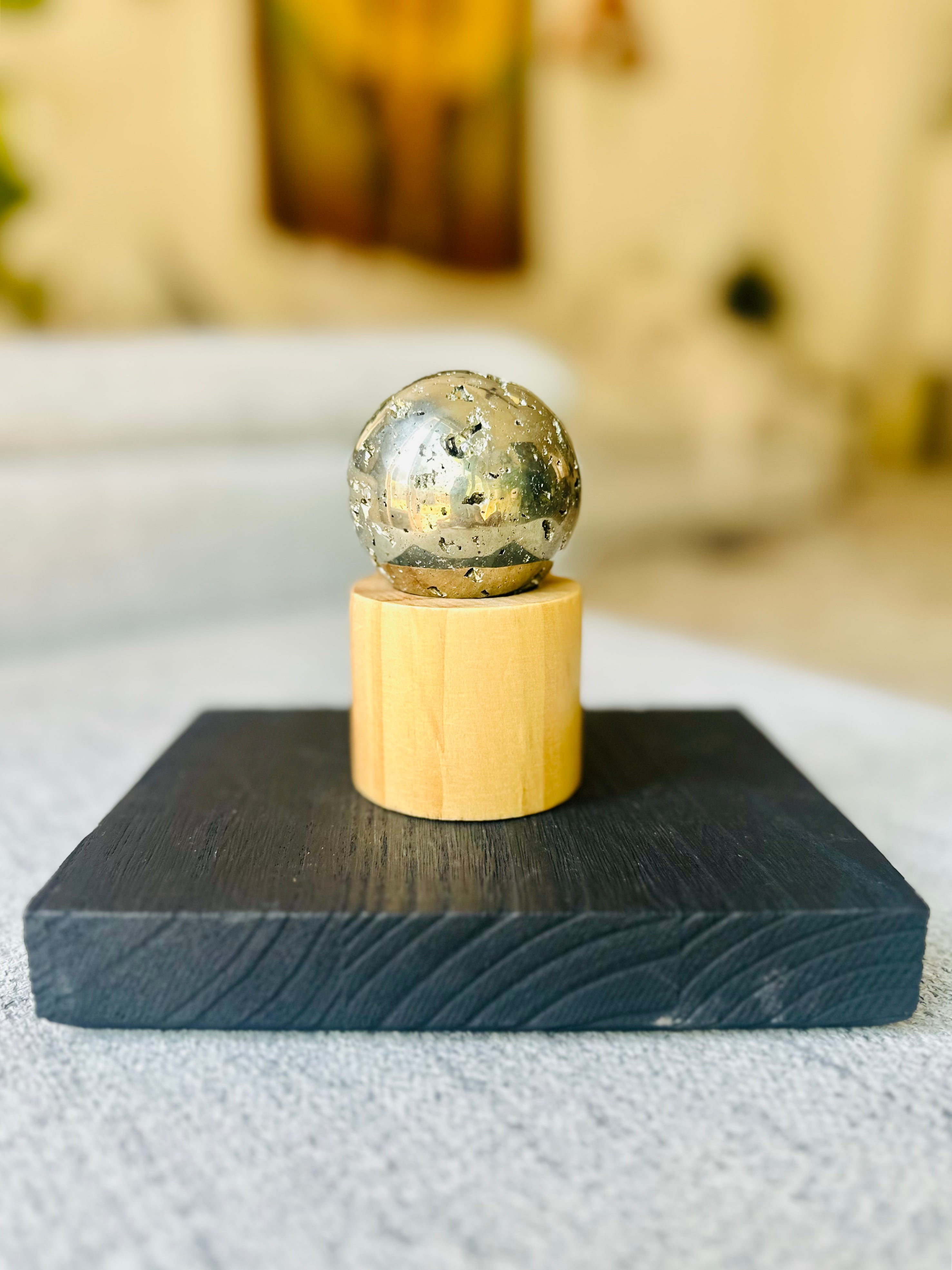 Pyrite Sphere with dazzling metallic luster, symbolizing wealth, protection, and abundance, perfect for meditation or decor