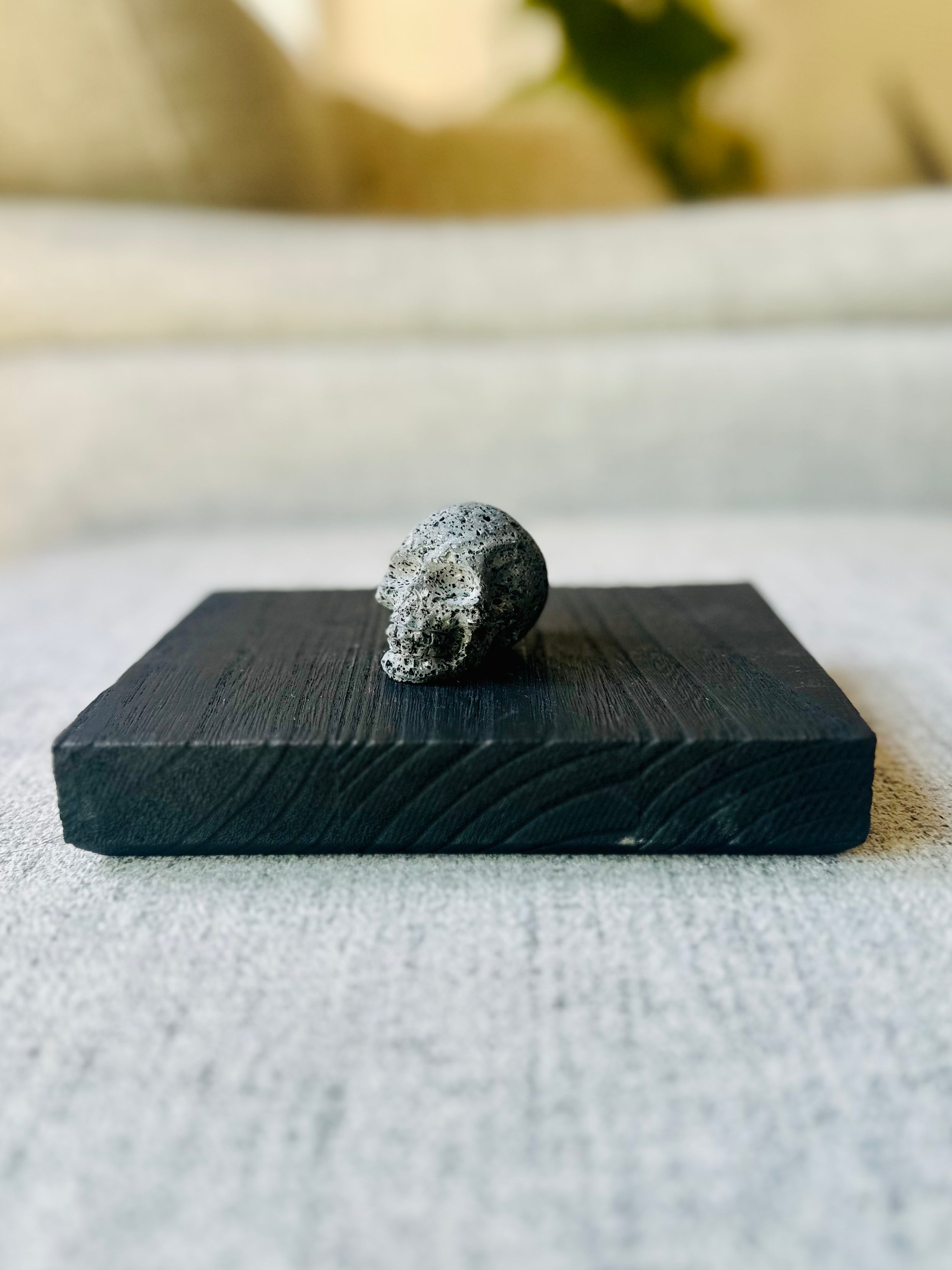 Lava Stone Skull, a unique addition to any collection, crafted from volcanic stone, representing resilience, protection, and transformation