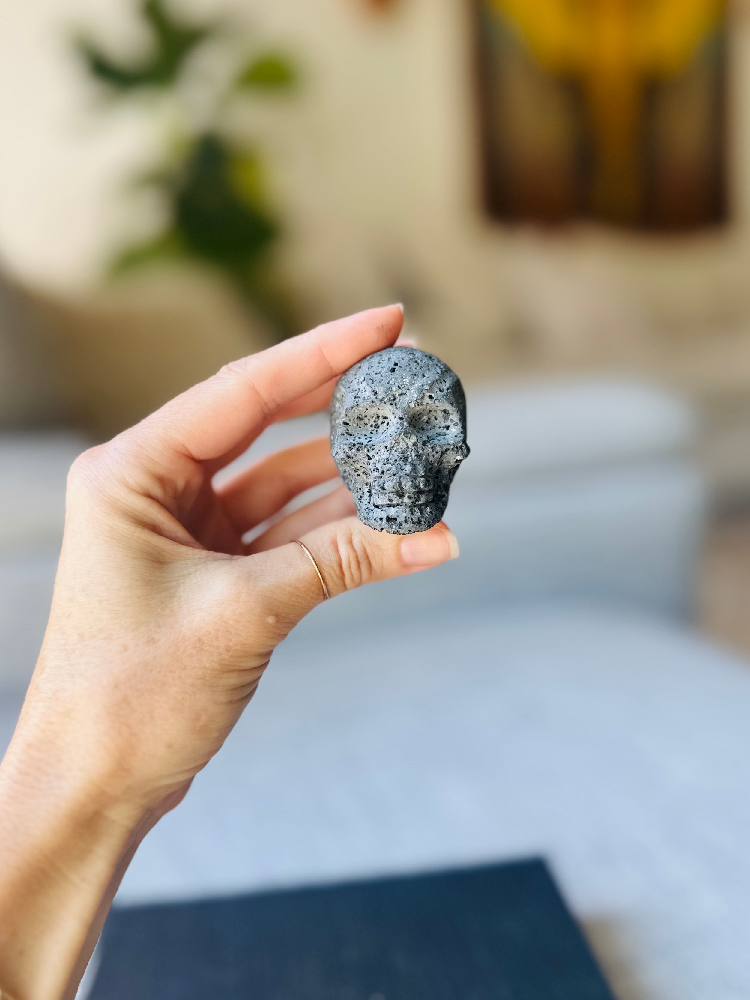 Lava Stone Skull, crafted from volcanic stone, embodies strength and grounding energy, a powerful symbol of resilience and transformation