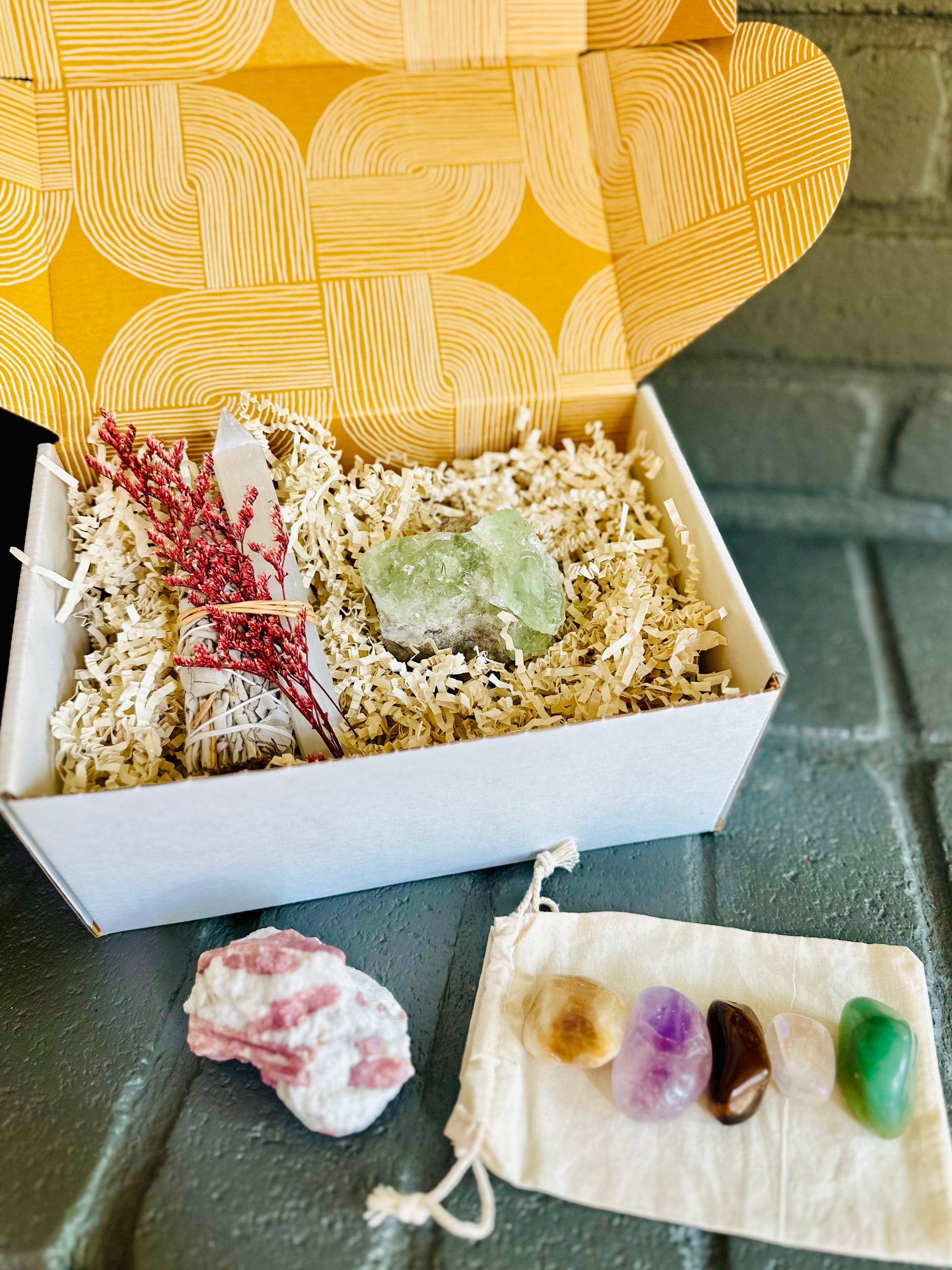 Radiant Energy Gift Box with White Sage, Selenite, Green Fluorite, Pink Tourmaline, and tumbled crystals to infuse your space with positive energy