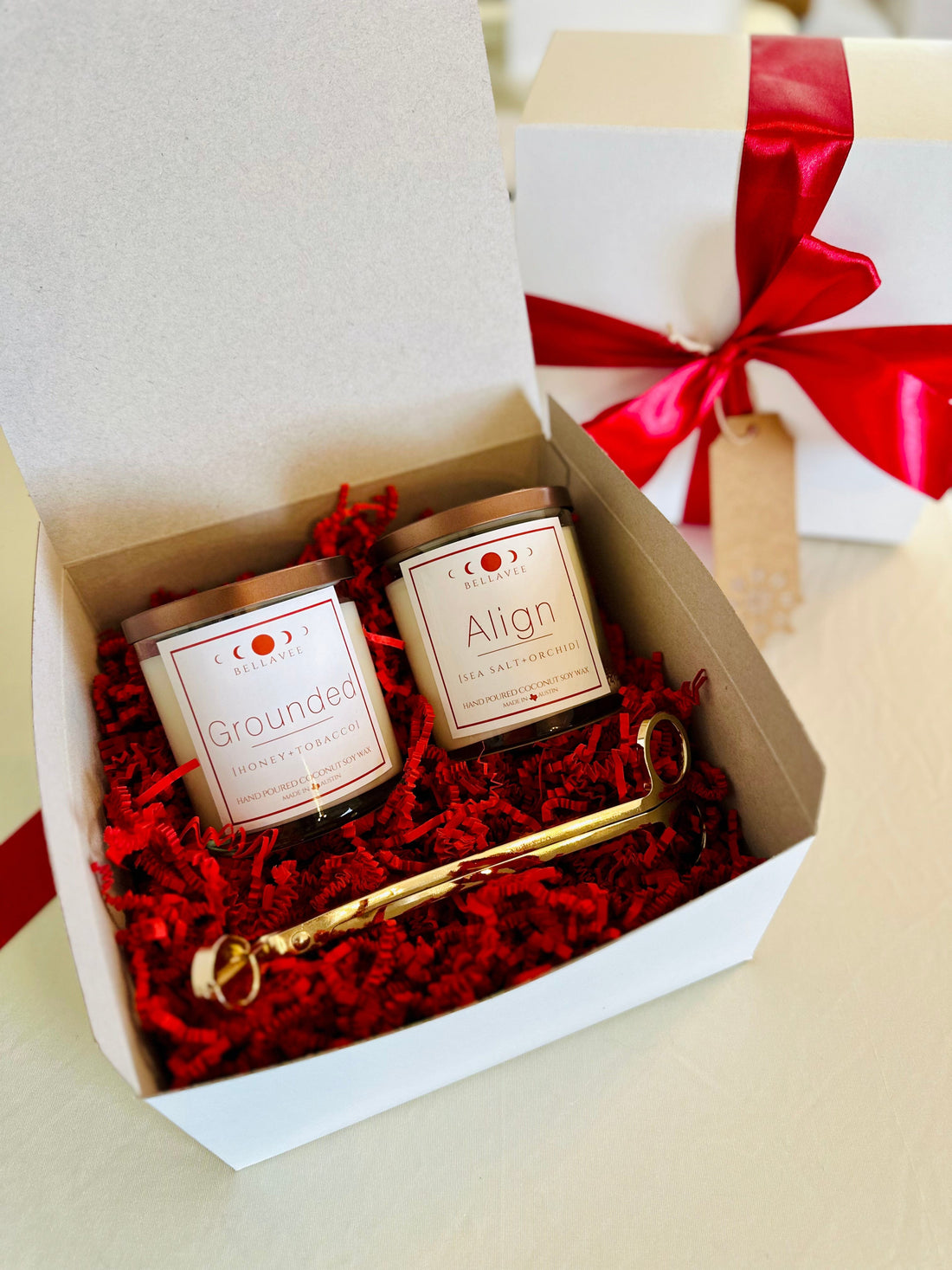 Best Sellers, Align Crystal Candle and Grounded crystal Candle along with a stunning wick trimmer in gold.