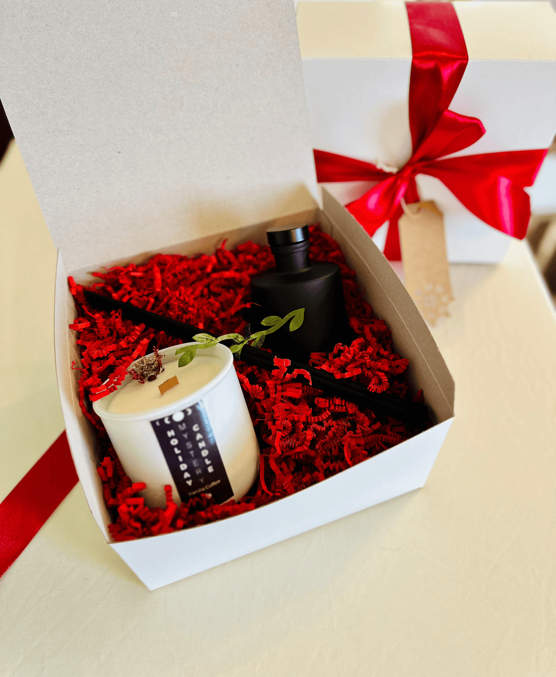 Holiday Gift Box with vanilla coffee and frosted juniper matte black diffuser.