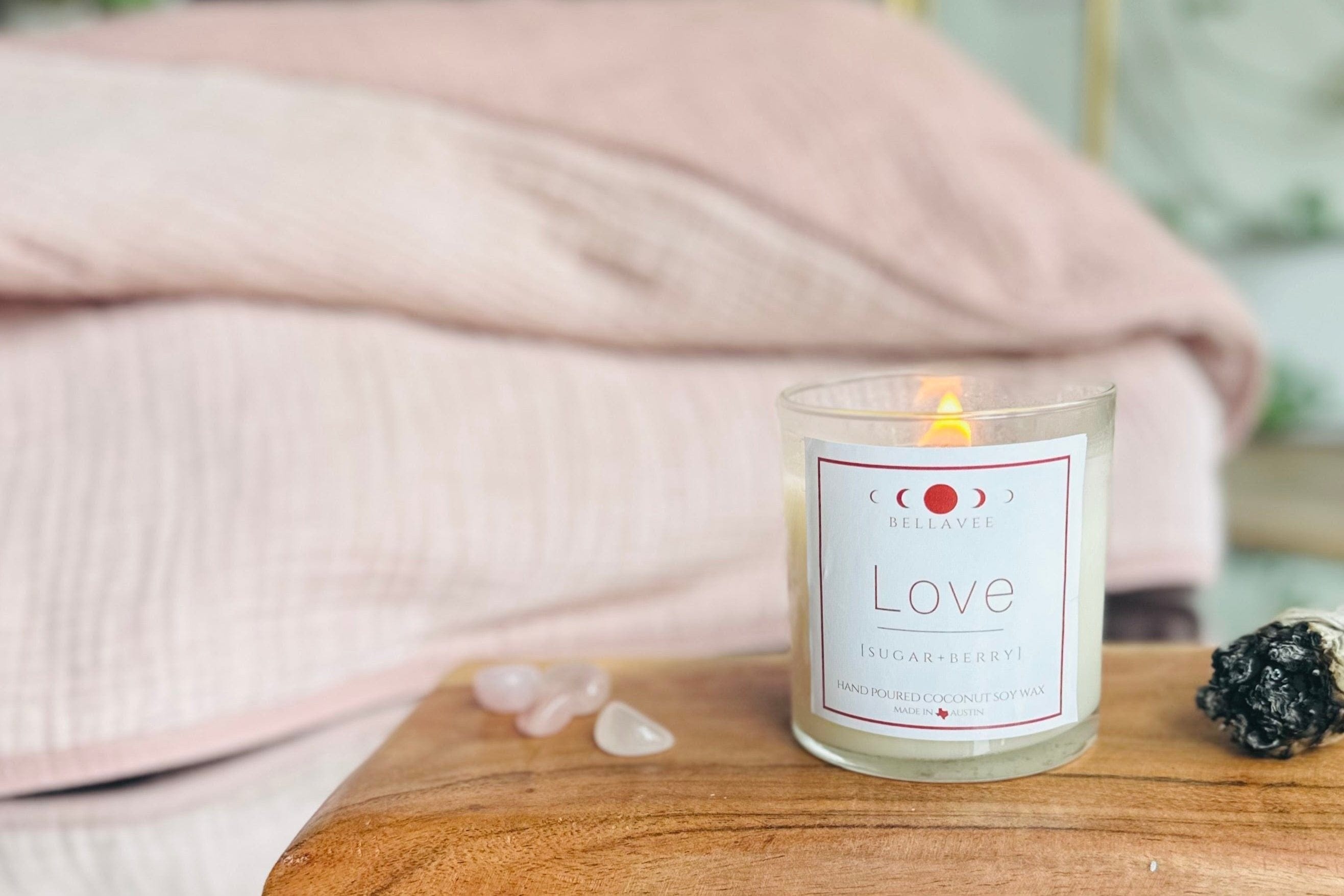 Love Crystal Candle with Rose Quartz, wooden wick, and a soothing blend of raspberry and black currant aromas, fostering peace and affection