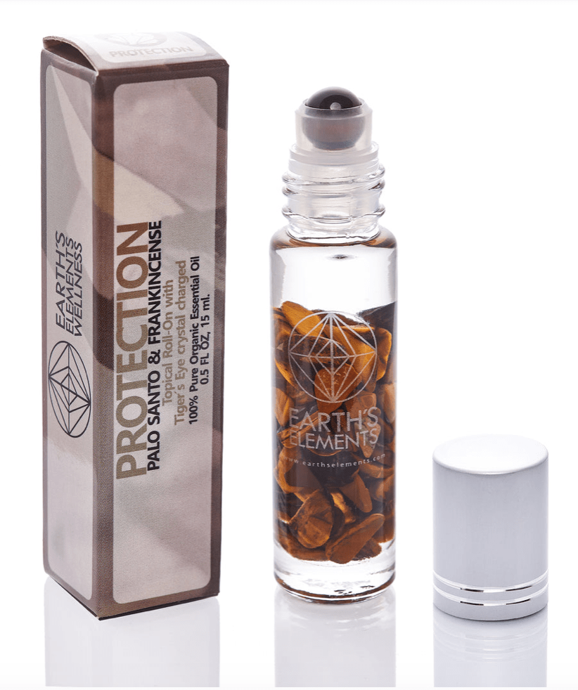 Protection Essential Oil Roll-on with Palo Santo, Frankincense, and Tiger’s Eye. Promotes safety, strength, and protection