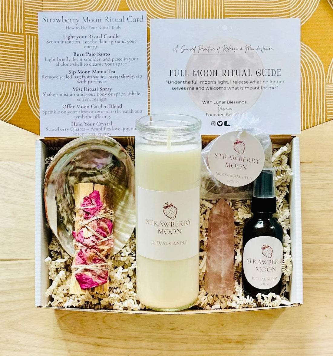 Strawberry Full Moon Ritual Box displayed with all items on a wooden background.
