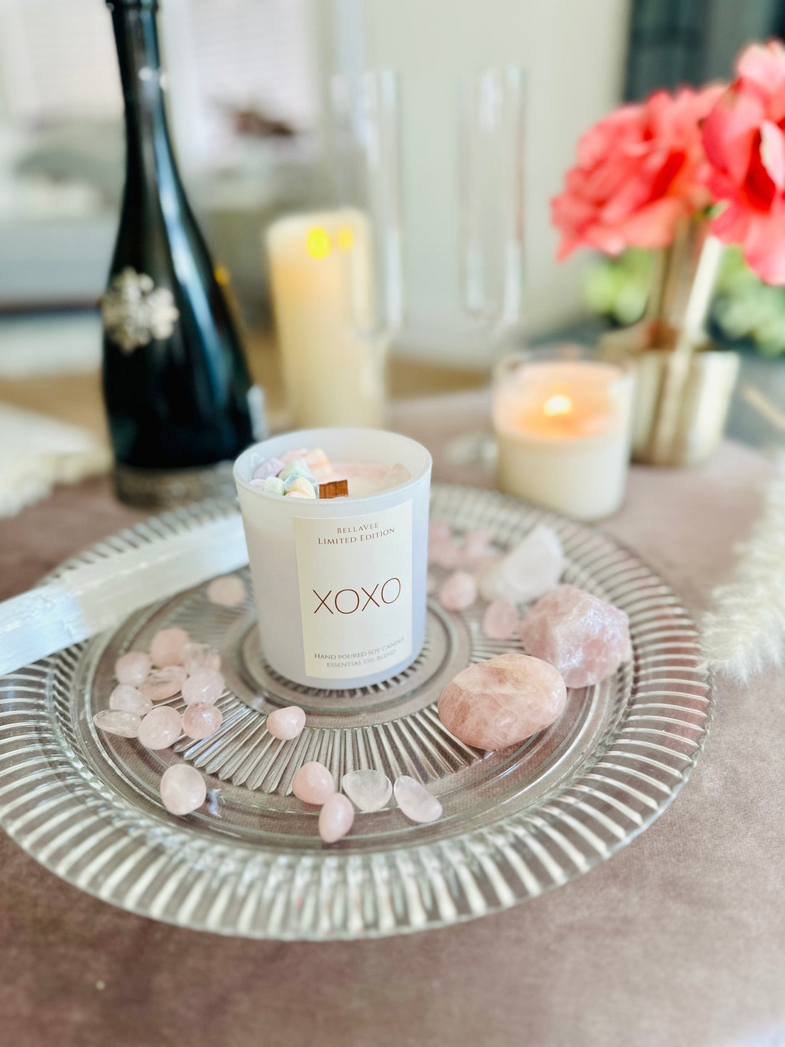 XOXO candle Valentines Day candle with wooden wick and rose quartz surrounding it