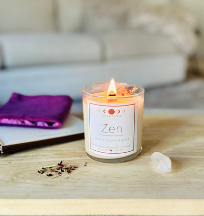 Lit Zen CBD Crystal Candle glowing with warm light, placed on a tabletop next to clear quartz and wellness items, evoking a calming aromatherapy ritual.