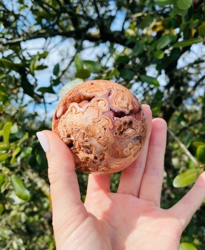 druzy crystal sphere, natural formation with sparkling surface, perfect for enhancing peace, tranquility, and spiritual growth