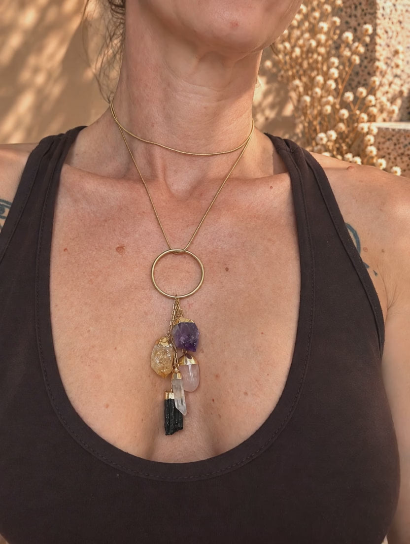 Power of Five crystal drop necklace worn and styled with layered crystal jewelry