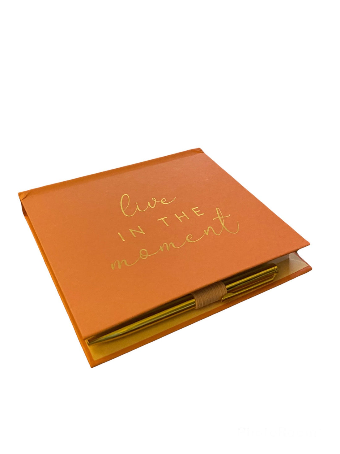 In the Moment Notepad with 100 pages and golden pen, perfect for jotting down thoughts and ideas with style at your desk or on the go
