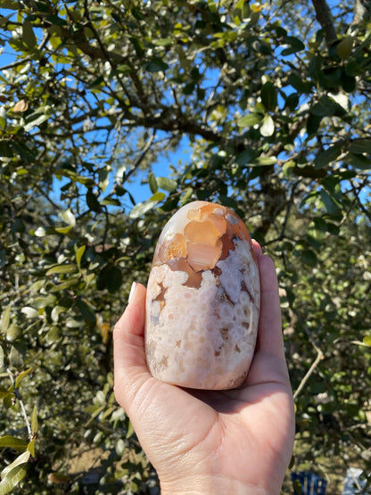flower agate crystal, stone of personal growth and manifesting potential, featuring floral formations of opaque chalcedony inclusions