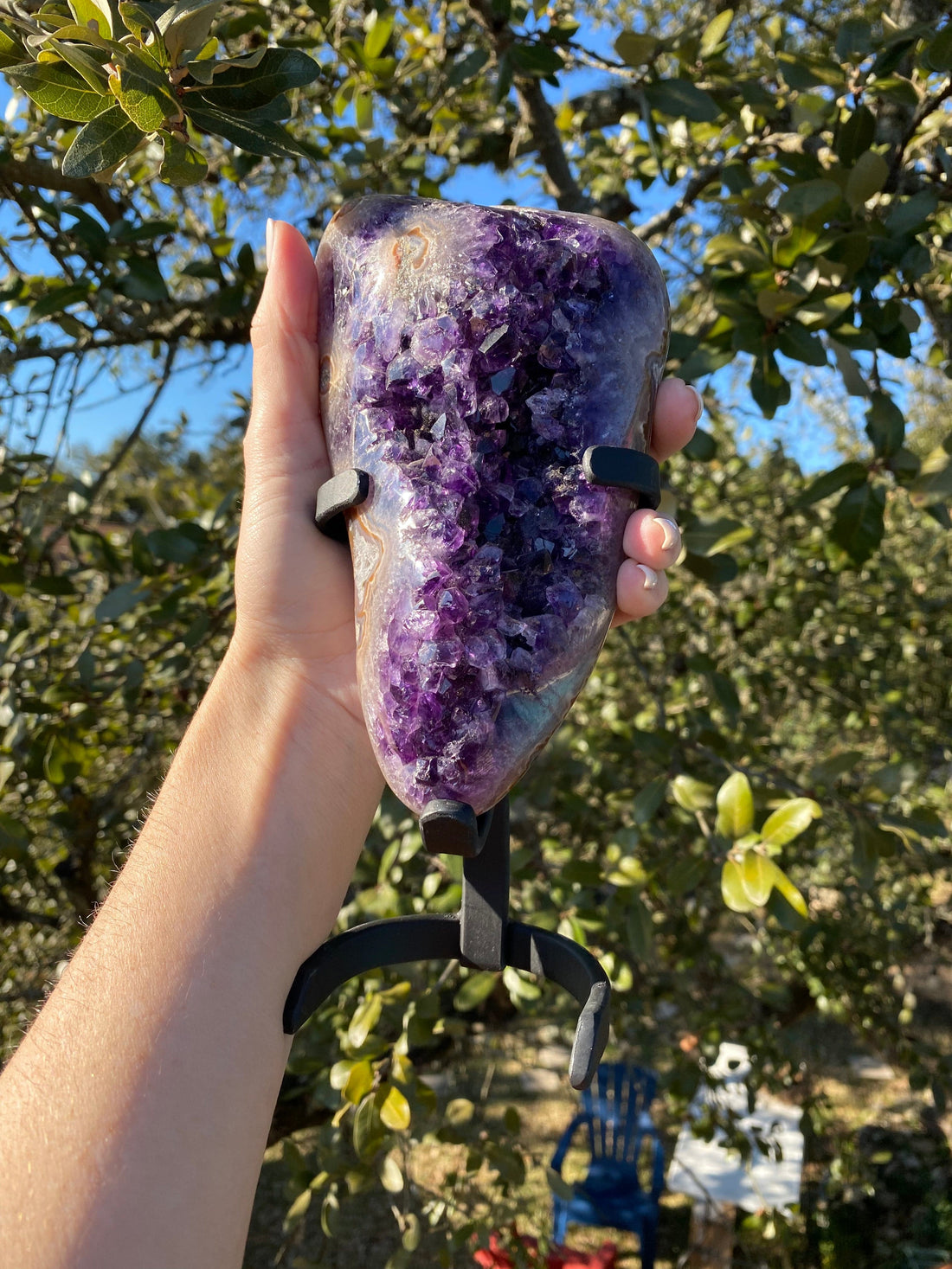 eyes of agate with amethyst freeform, glistening under the sun, highlighting the rich purple amethyst and intricate agate banding