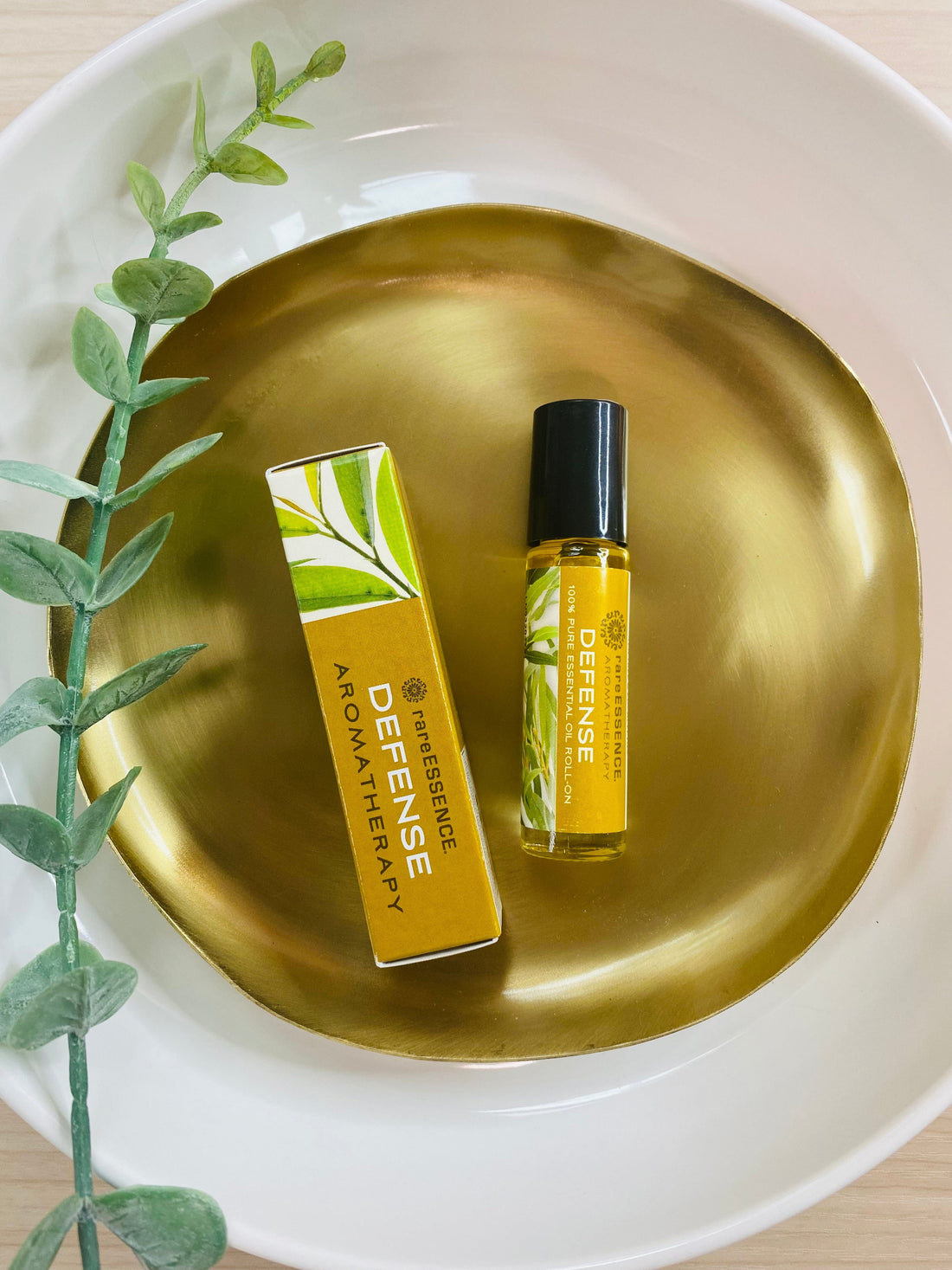 defense essential oil roll-on with tea tree, eucalyptus, and clove, providing natural defense and aromatherapy benefits in a portable roll-on